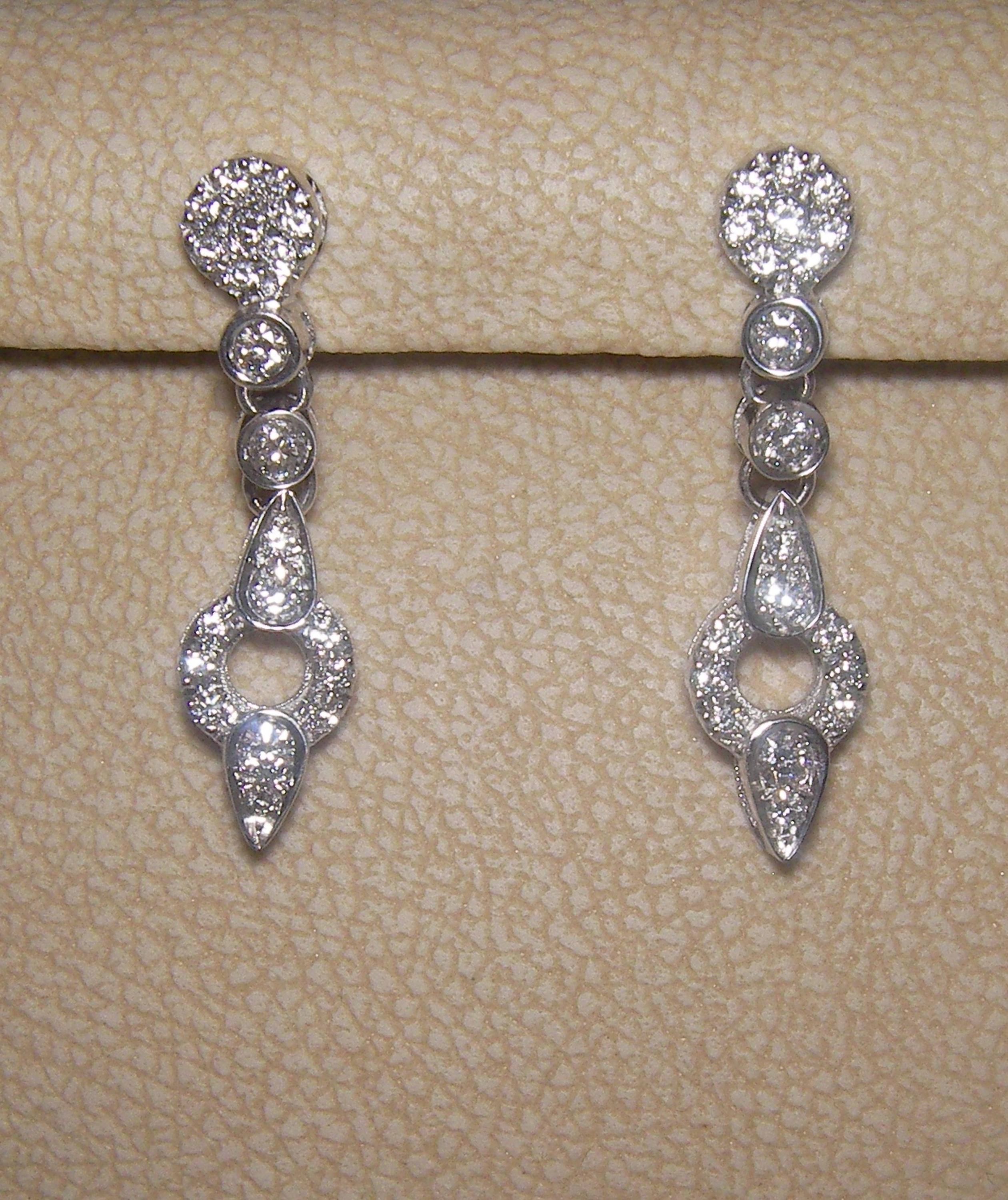 18 Karat White Gold Diamond Dangle Earrings


44 Diamonds 0,72 Carat

Founded in 1974, Gianni Lazzaro is a family-owned jewelery company based out of Düsseldorf, Germany.
Although rooted in Germany, Gianni Lazzaro's style and design is more