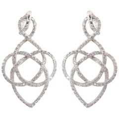 Boucles d'oreilles pendantes en or blanc 18 carats et diamants