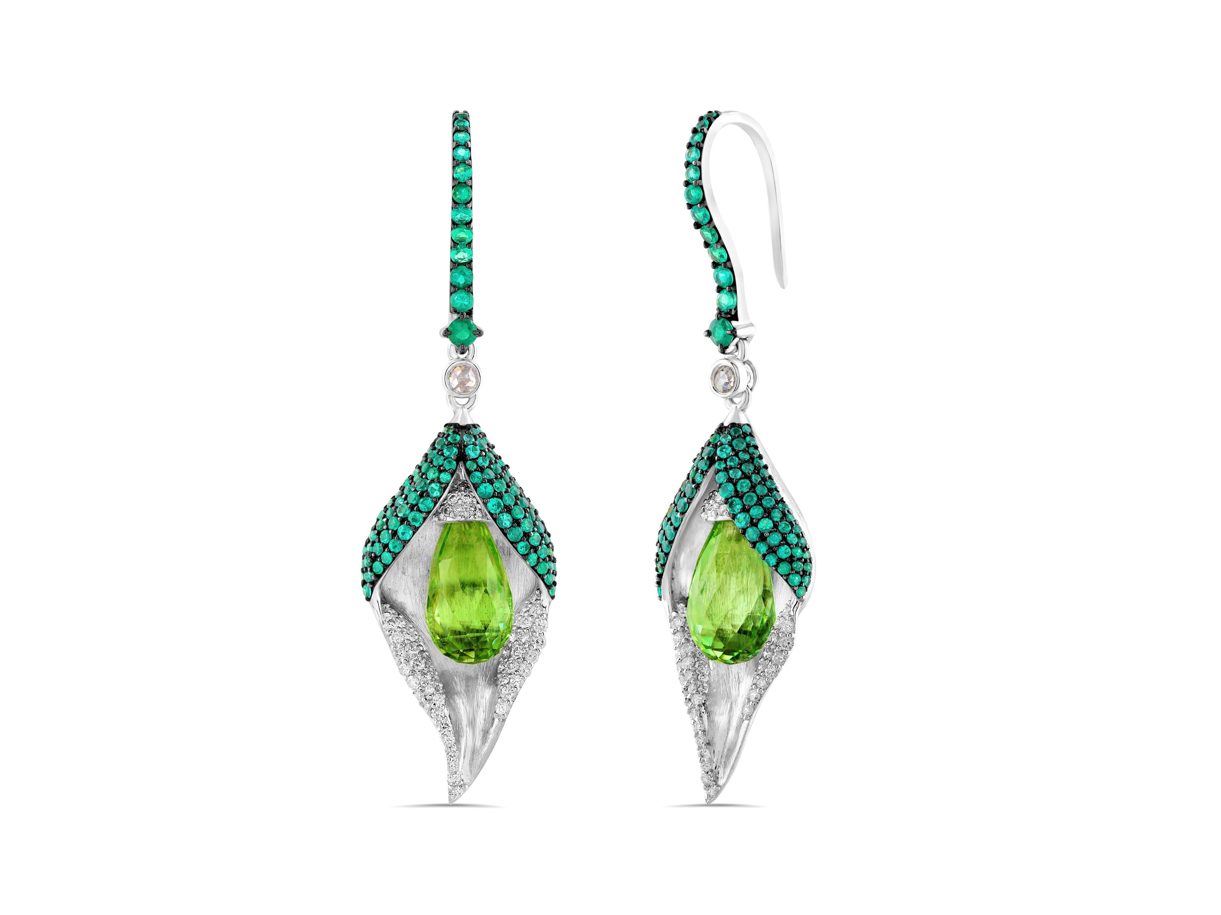 Inspired by a leaf and bud, these gorgeous diamond earrings in 18 karat white gold with emeralds and peridot drops really do take a leaf out of nature's book.

The stunning vibrance of the peridot is beautifully complemented by brilliant-cut