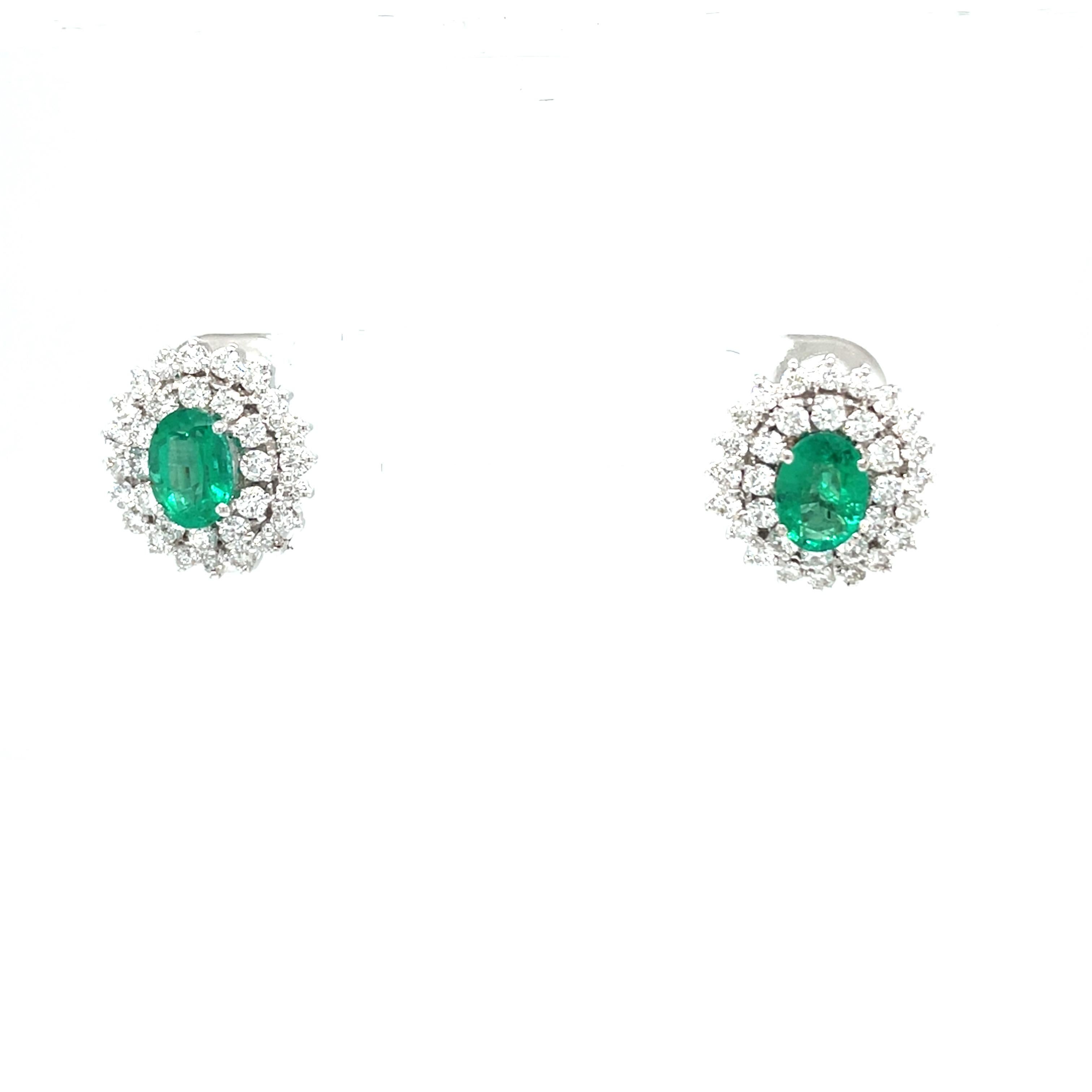 This 18K white gold elegant drop earrings are from our Timeless collection. These stud earrings are made of natural white diamonds in total of 1.54 Carat and natural oval emeralds in total of 1.47 Carat. Total metal weight is 7.20 gr. They are 1.5cm