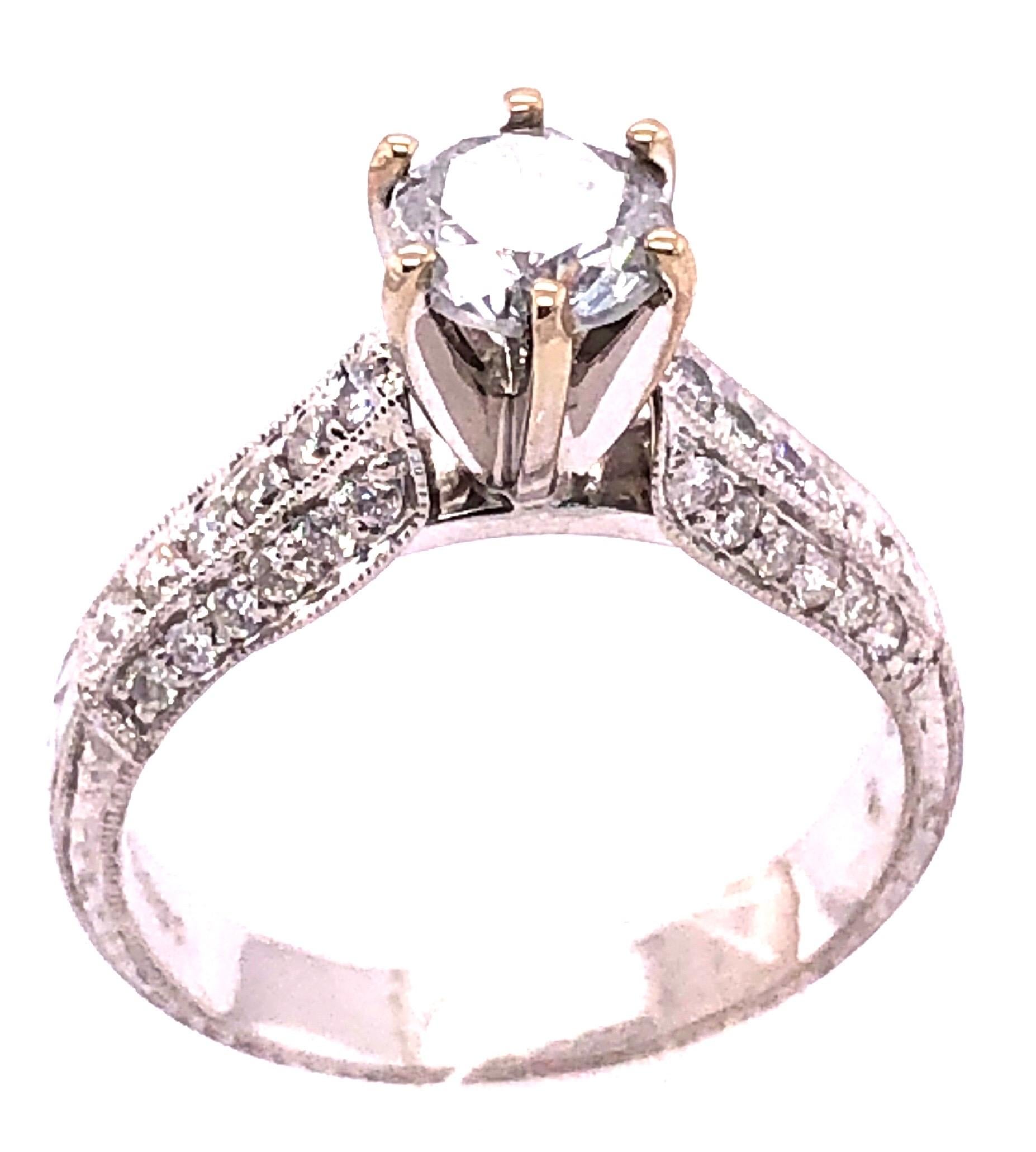 18 Karat White Gold Diamond Engagement Ring 1.40 Total Diamond Weight.
Size 6.75 
4.55 grams total weight.