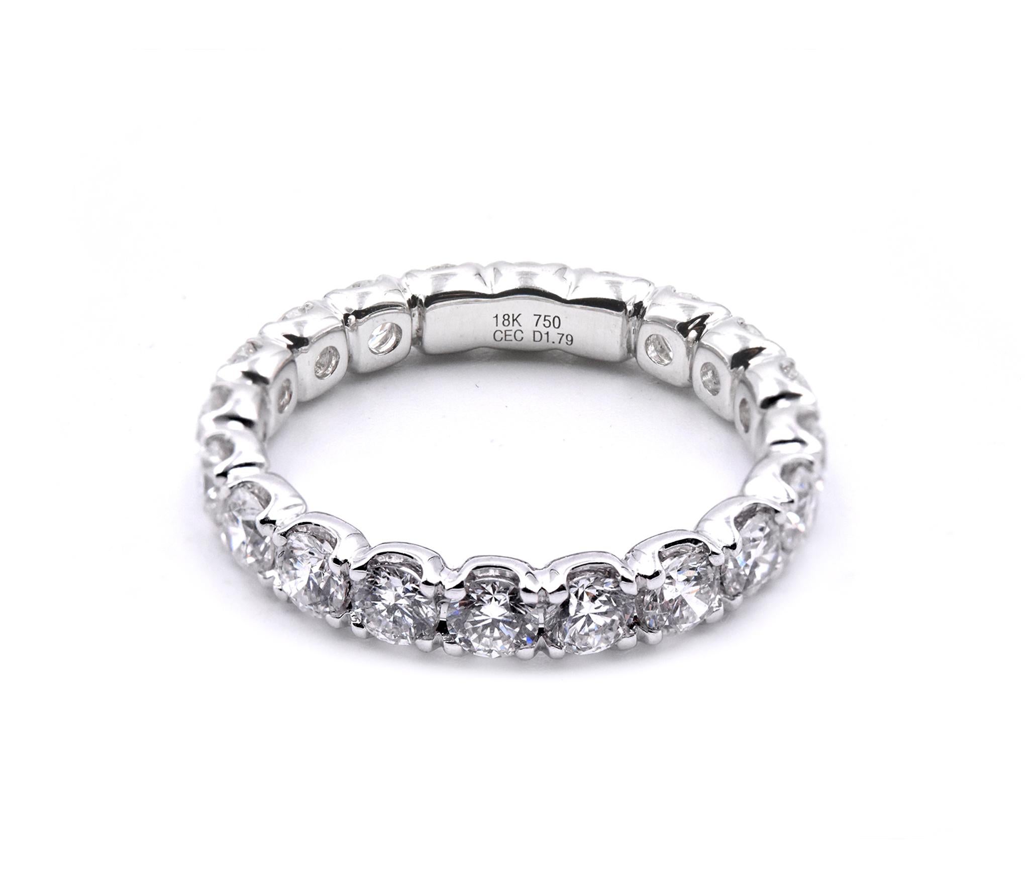 Material: 18k white gold
Diamonds: 20 round brilliant cut= 1.79cttw
Color: G
Clarity: VS
Ring Size: 5.75
Dimensions: ring is 3.33mm wide
Weight: 2.85 grams

