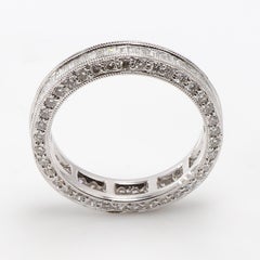 18 Karat White Gold Diamond Eternity Ring with Baguette Diamonds