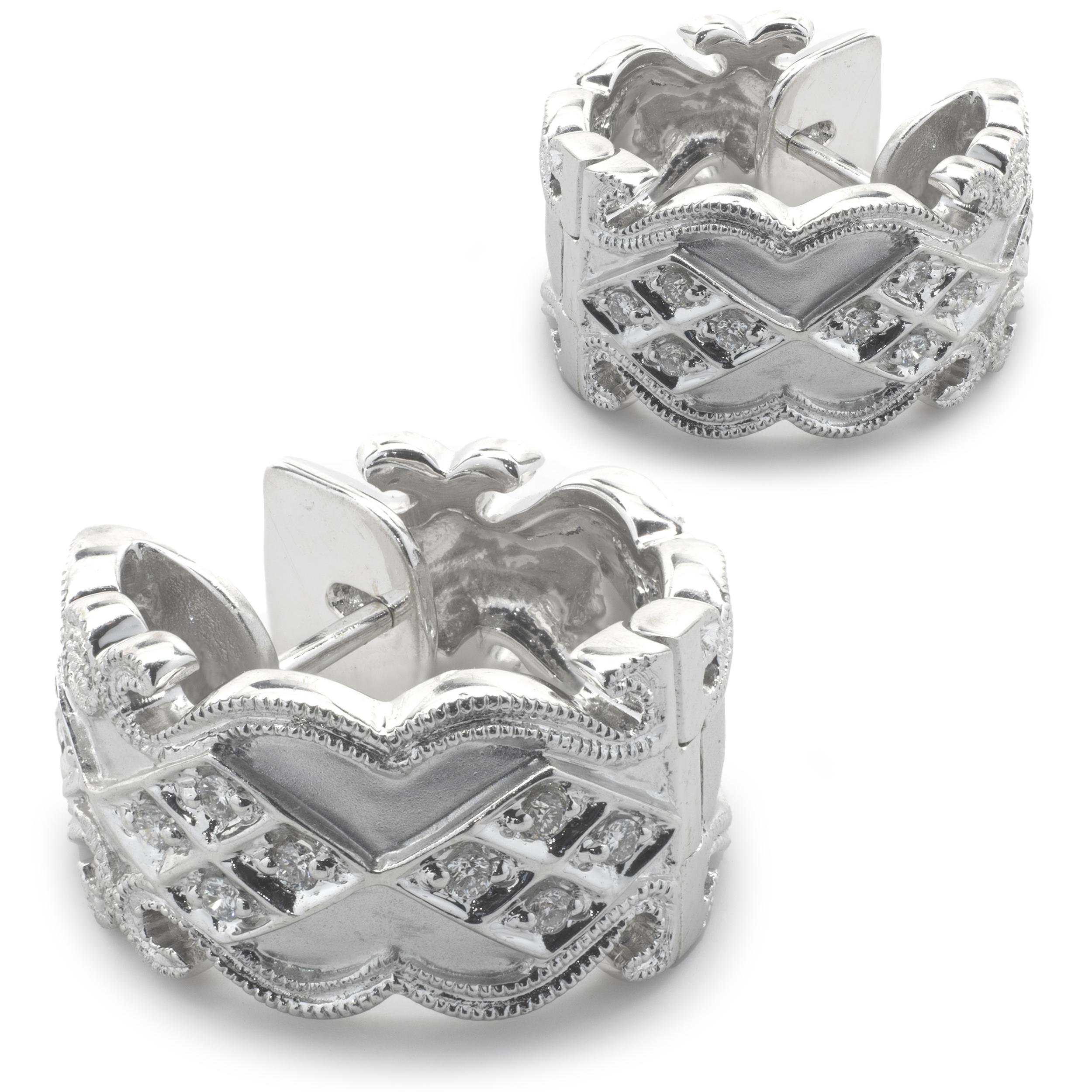 Designer: custom
Material: 18K white gold
Diamond: round brilliant diamonds .22cttw
Color: G
Clarity: VS2
Dimensions: earrings measure 17.8 X 9.51mm
Fastenings: post with snap backs
Weight: 14.90 grams
