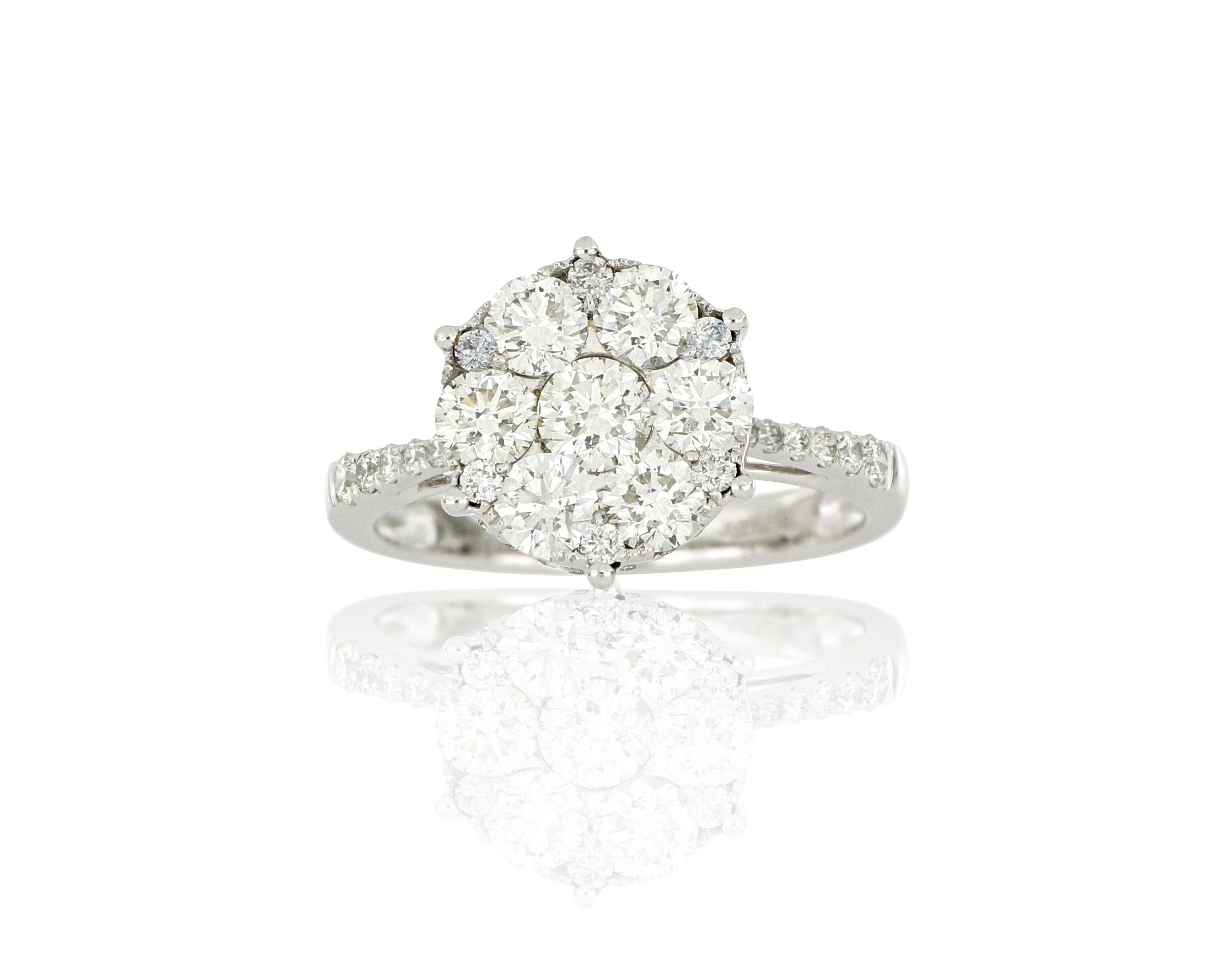 A diamond fashion ring, composed of clusters of brilliant-cut diamonds weighing approximately 1.98 carats, mounted in 18 Karat white gold. 
A very  beautiful ring which can be worn for any occasion. 
O’Che 1867 is renowned for its high jewellery