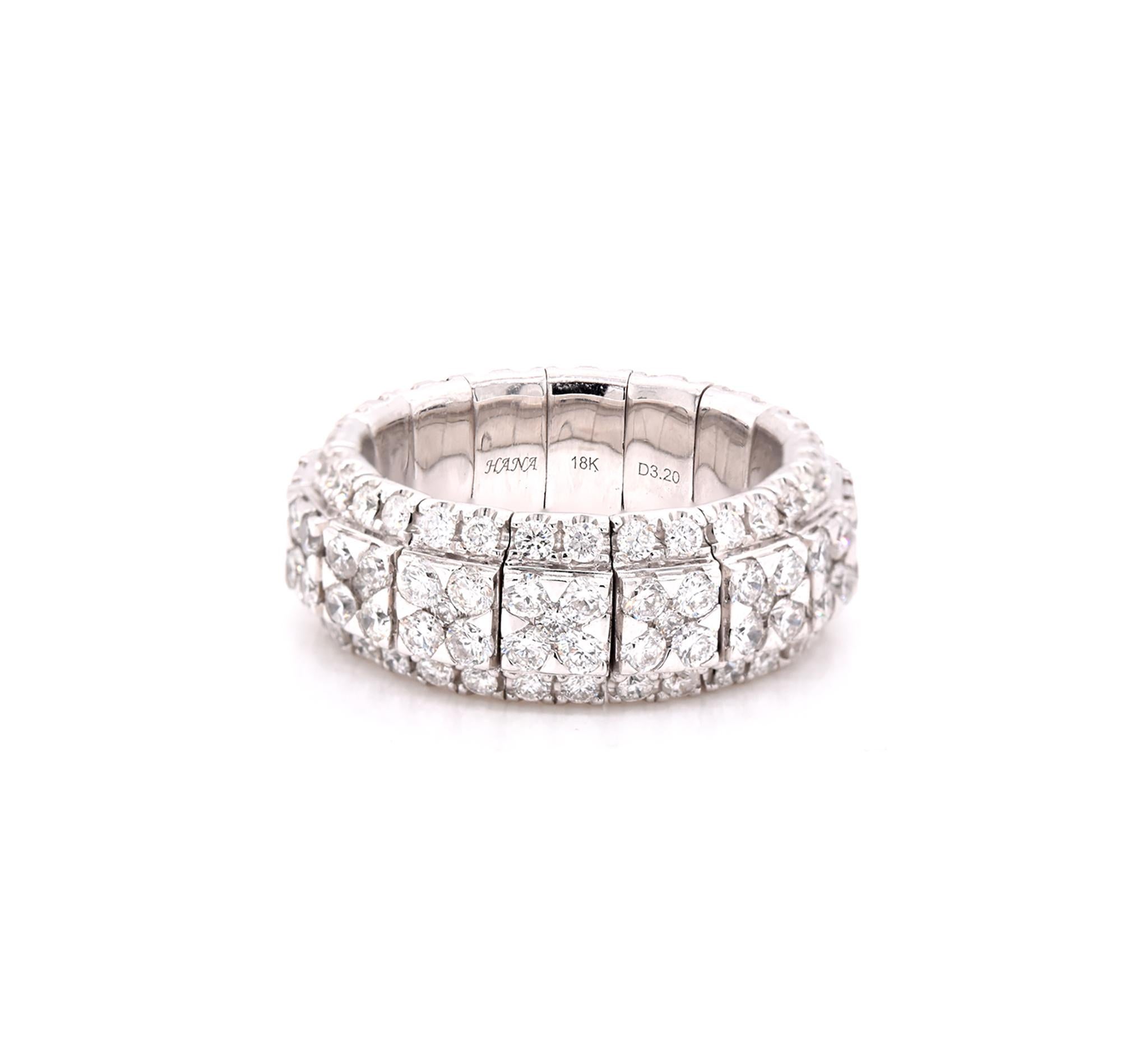 Material: 18K white gold
Diamonds: 144 round cut = 3.20cttw
Color: G
Clarity: VS
Ring Size: 6 .5(Please allow up to two additional business days for sizing requests)
Dimensions: ring top measures 8mm in width 
Weight: 9.65 grams