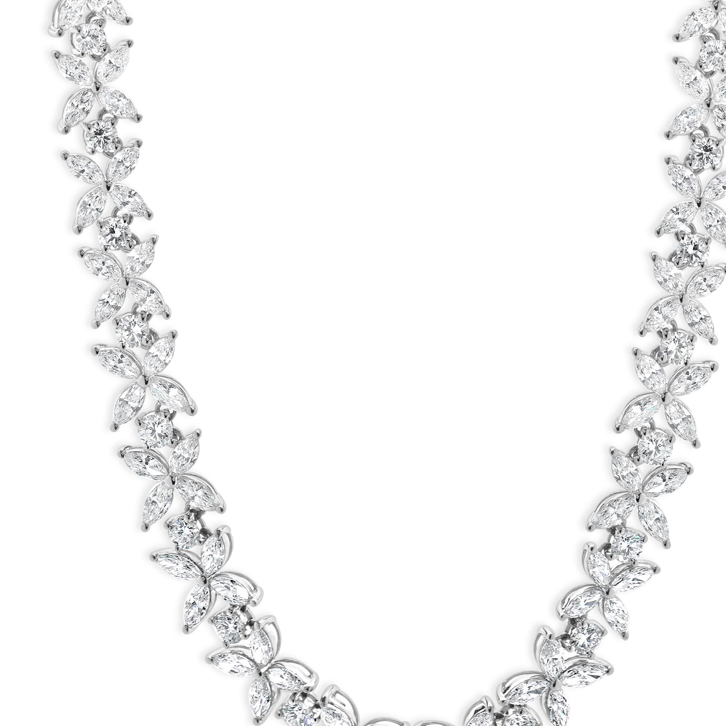 Designer: custom
Material: 18K white gold
Diamonds: 144 round brilliant & marquise cut = 12.82cttw
Color: G / H
Clarity: VS-SI1
Dimensions: necklace measures 14-inches in length
Weight: 32.24 grams