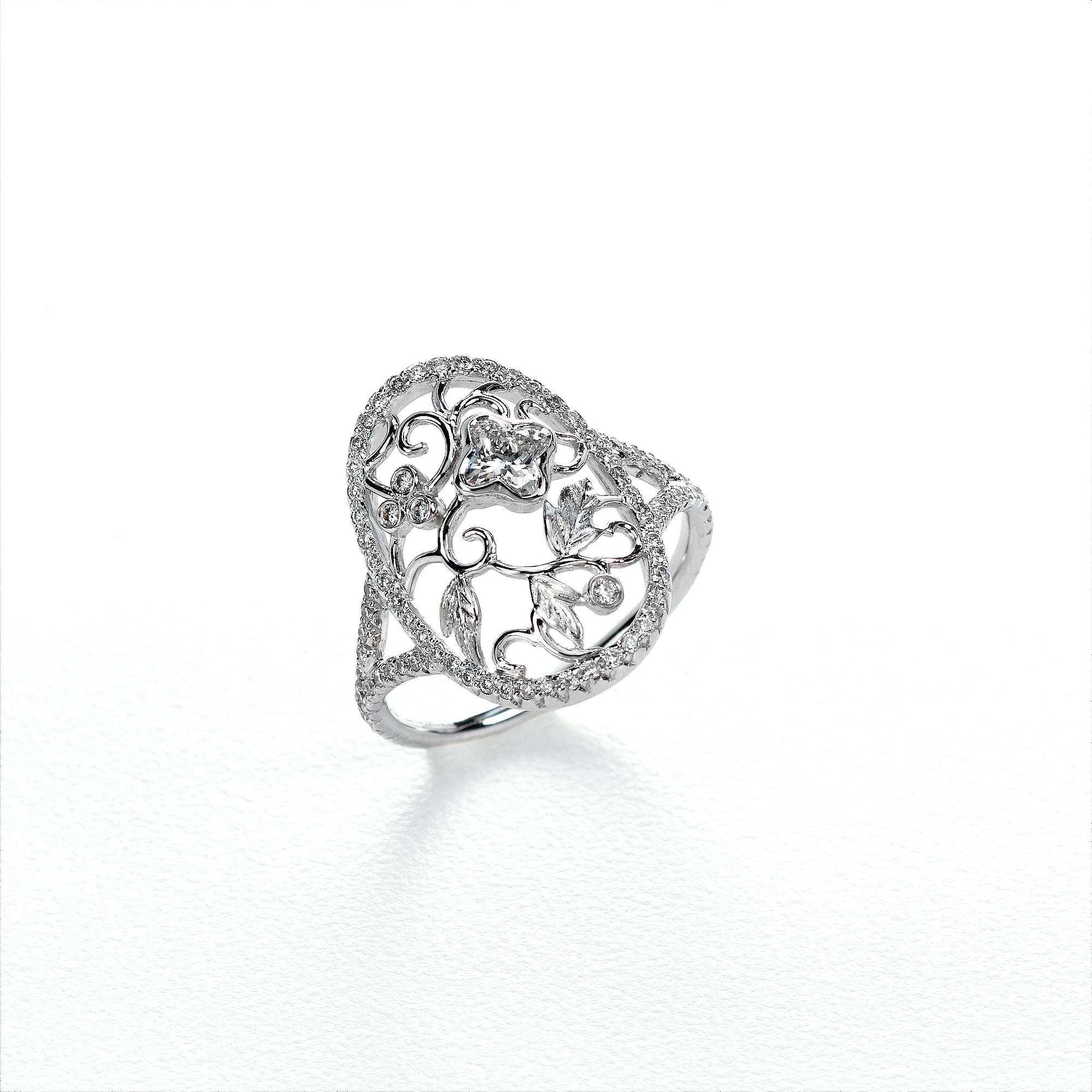 18 Karat White Gold Diamond Flower leaf Cocktail ring 0.62 Carat Total  .1 LILY CUT ® flower shape diamond H color VS SI clarity  0.30 cts . Additional 0.32 ct round diamond accent . Available in  Finger sizes 5,6,7 .