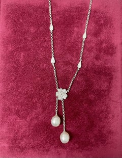 Halskette mit Blumenanhänger aus 18 Karat Weißgold mit Diamanten