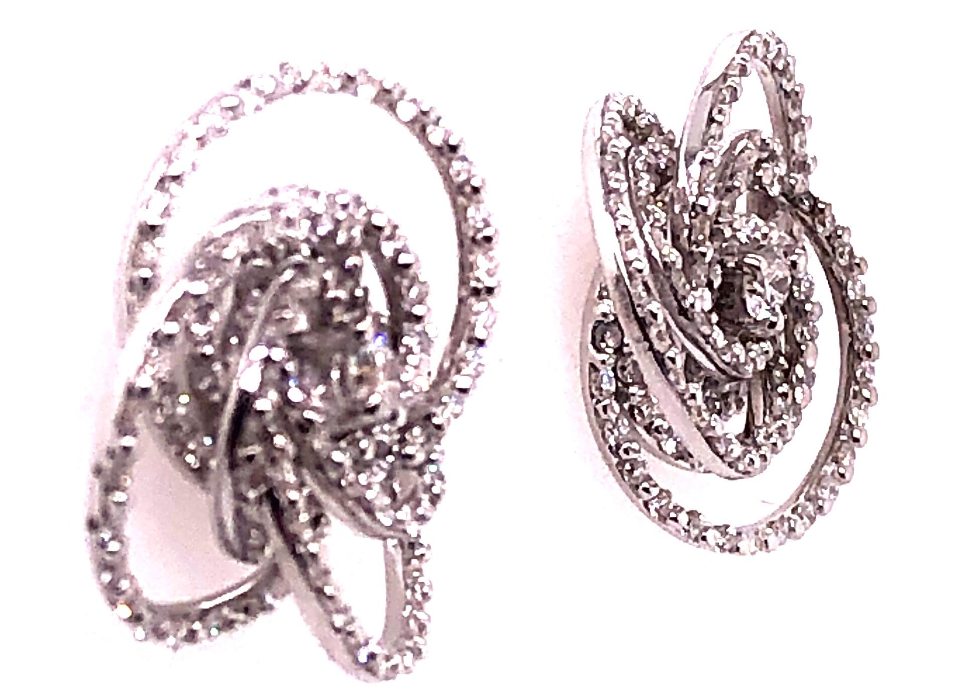 Contemporary 18 Karat White Gold Diamond Flower Swirl Stud Earrings by H2 at Hammerman For Sale