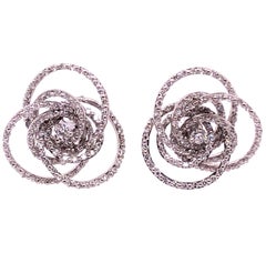 18 Karat White Gold Diamond Flower Swirl Stud Earrings by H2 at Hammerman