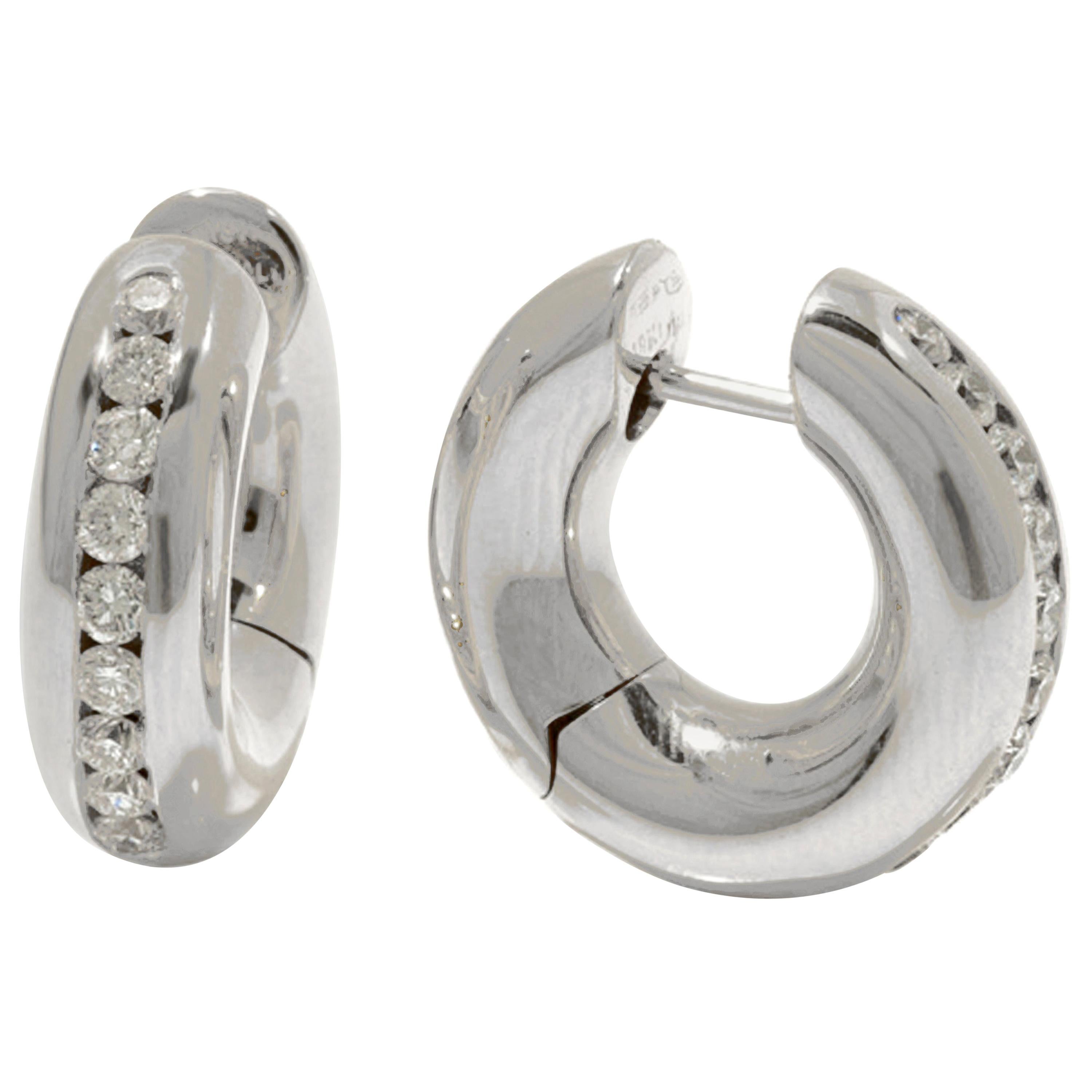 18KT Gelbgold Diamant GARAVELLI HUGGIE OHRRINGE 
Die traditionellen und klassischen Huggies für jeden Tag.
Außendurchmesser mm 18
Dicke mm5
Frühjahrsabschluss
18KT GOLD  gr: 9
WEISSE DIAMONEN ct : 0,80