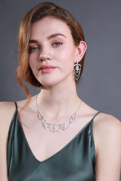 18 Karat White Gold Diamond Grand Leaf Earrings