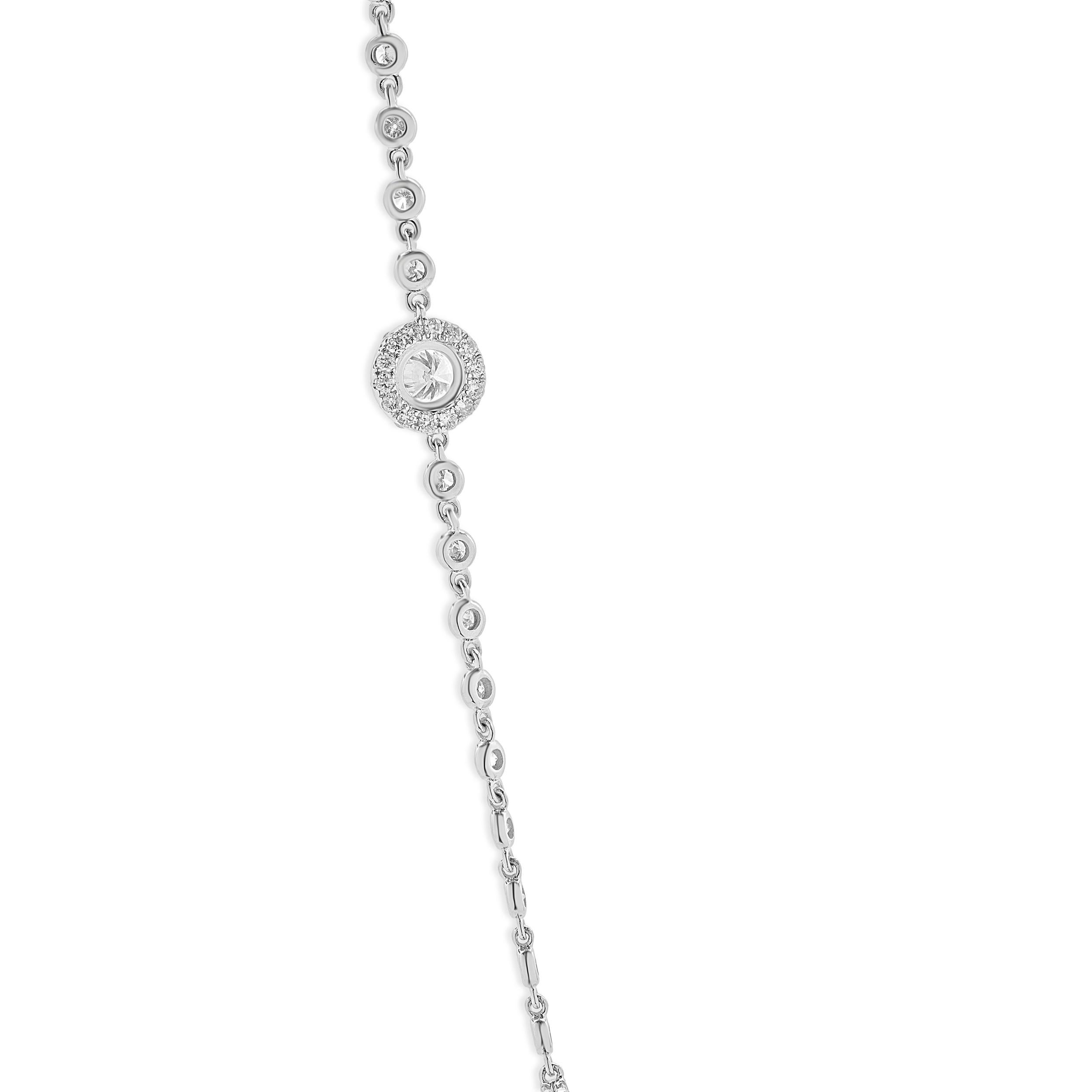 Designer: custom
Material: 18K white gold
Diamonds: 370 round brilliant cut = 6.10cttw
Color: G / H
Clarity: VS2-SI1
Dimensions: necklace measures 22-inches in length
Weight: 12.04 grams
