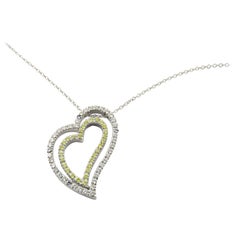 Pendentif cœur en or blanc 18 carats et diamants