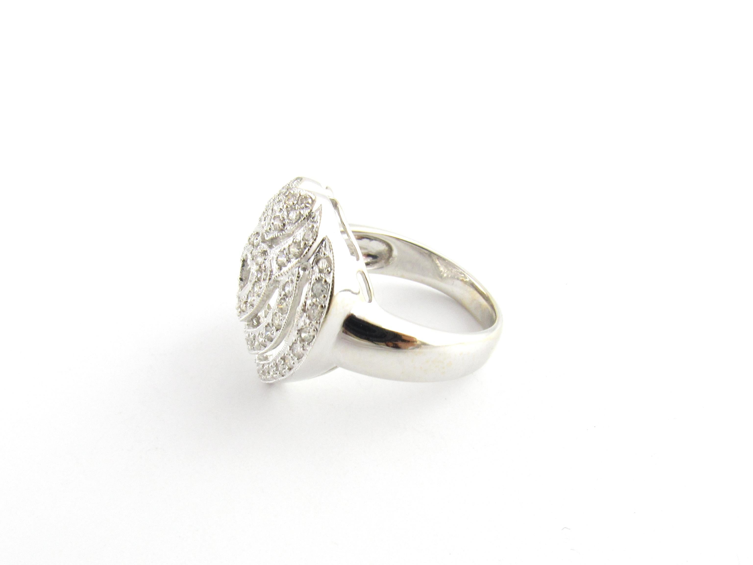 Vintage 18 Karat White Gold Diamond Heart Ring Size 7

This sparkling ring features 64 round brilliant cut diamonds set in a lovely heart design. Top of ring measures 20 mm x 18 mm. Shank measures 3 mm.

Approximate total diamond weight: .64