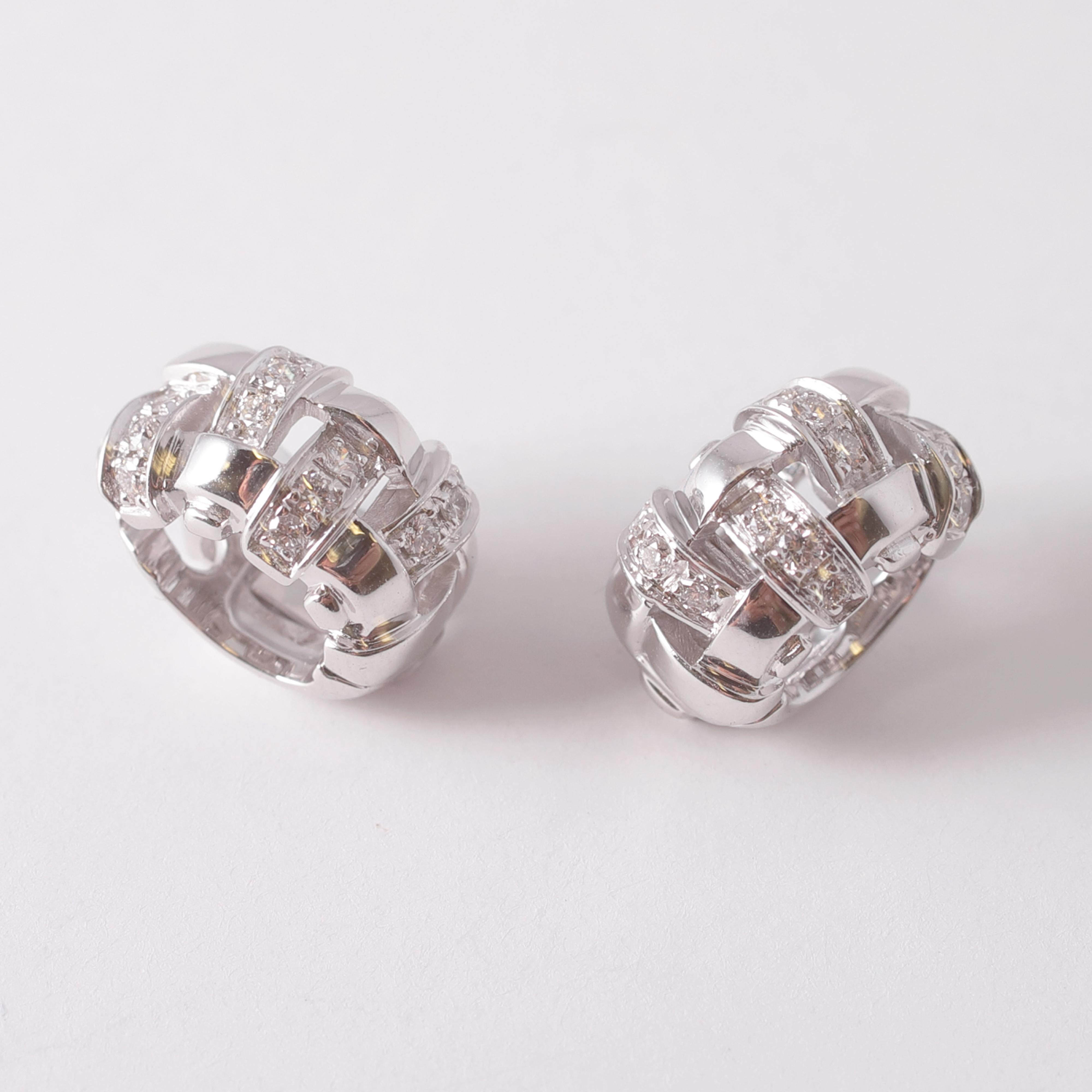 So very comfortable on the ear!  These white gold earrings by Tiffany & Co are in a basket weave style and support 0.40 carats of diamonds. 