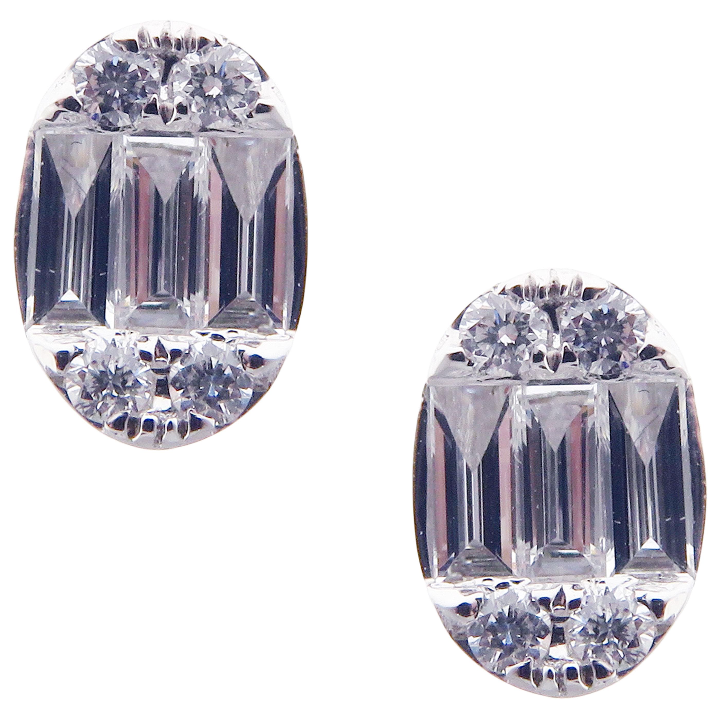 This round and baguette combination diamond illusion oval-shape stud earring is crafted in 18-karat white gold, featuring 8 round white diamonds totaling of 0.14 carats and 6 baguette white diamonds totaling of 0.46 carats.
Approximate total weight