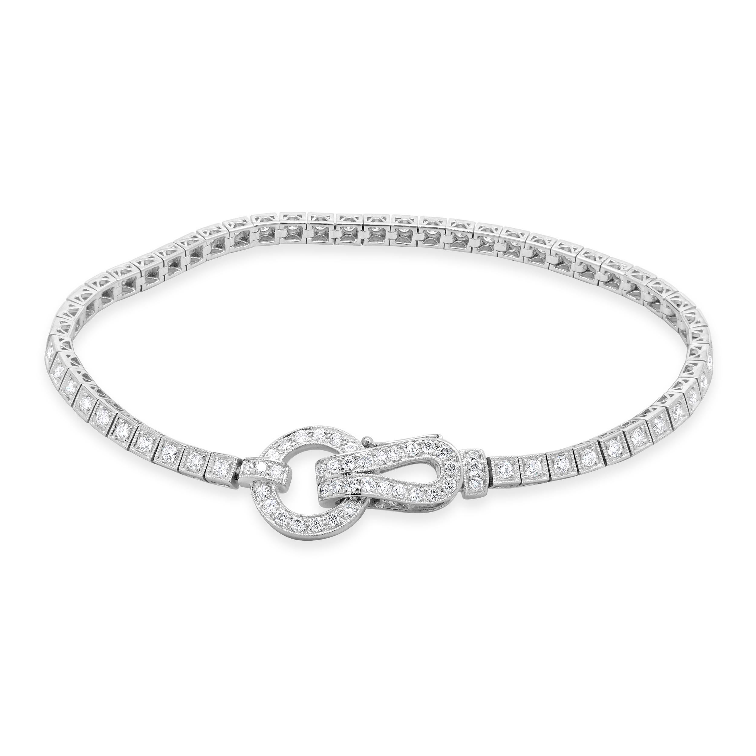 Designer: custom design
Material: 18K white gold
Diamond: 90 round brilliant diamonds= 1.40cttw
Color: H
Clarity: SI1-SI2
Dimensions: bracelet will fit up to a 7-inch wrist
Weight: 15.03 grams
