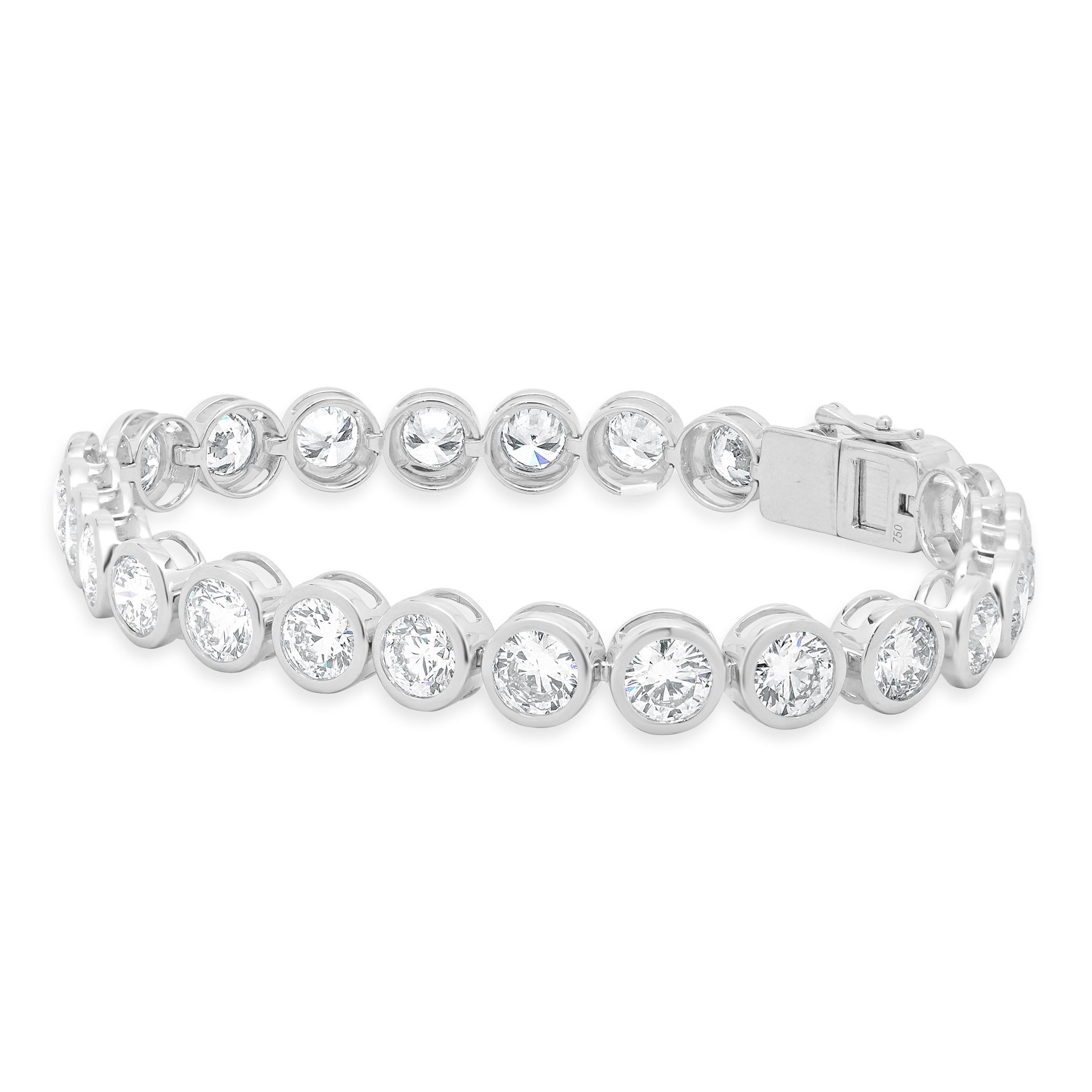 Designer: design personalizzato
Materiale: oro bianco 18 carati
Diamante: 26 tagli rotondi a brillante = 13,75cttw
Colore: G / H.
Chiarezza: VS-SI1
Dimensioni: il braccialetto si adatta a un polso di 7.5 pollici
Peso: 19,79 grammi