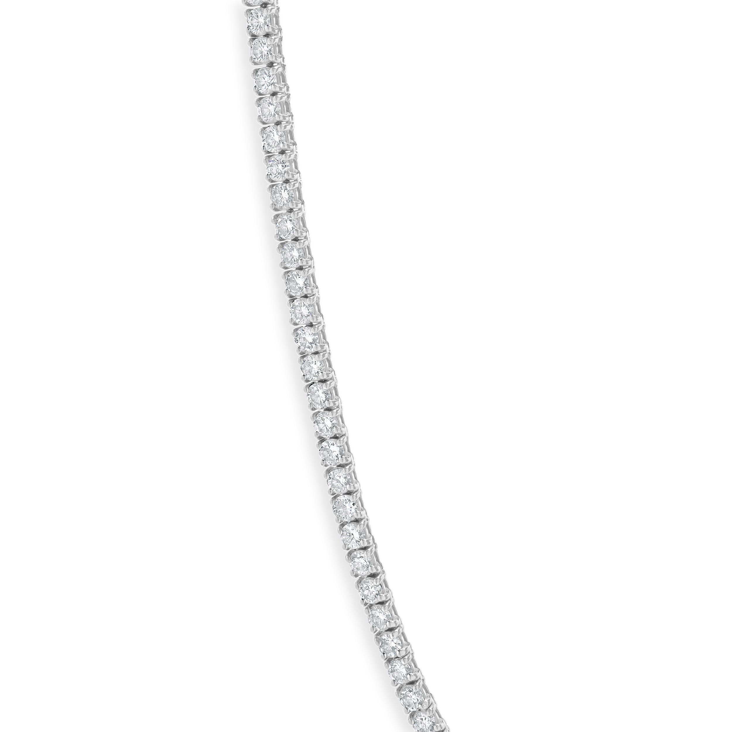 Designer: custom
Material: 18K yellow gold
Diamonds: 188 round brilliant cut = 7.52cttw
Color: H/I
Clarity: SI2-I1
Dimensions: necklace measures 17-inches in length
Weight: 17.82 grams