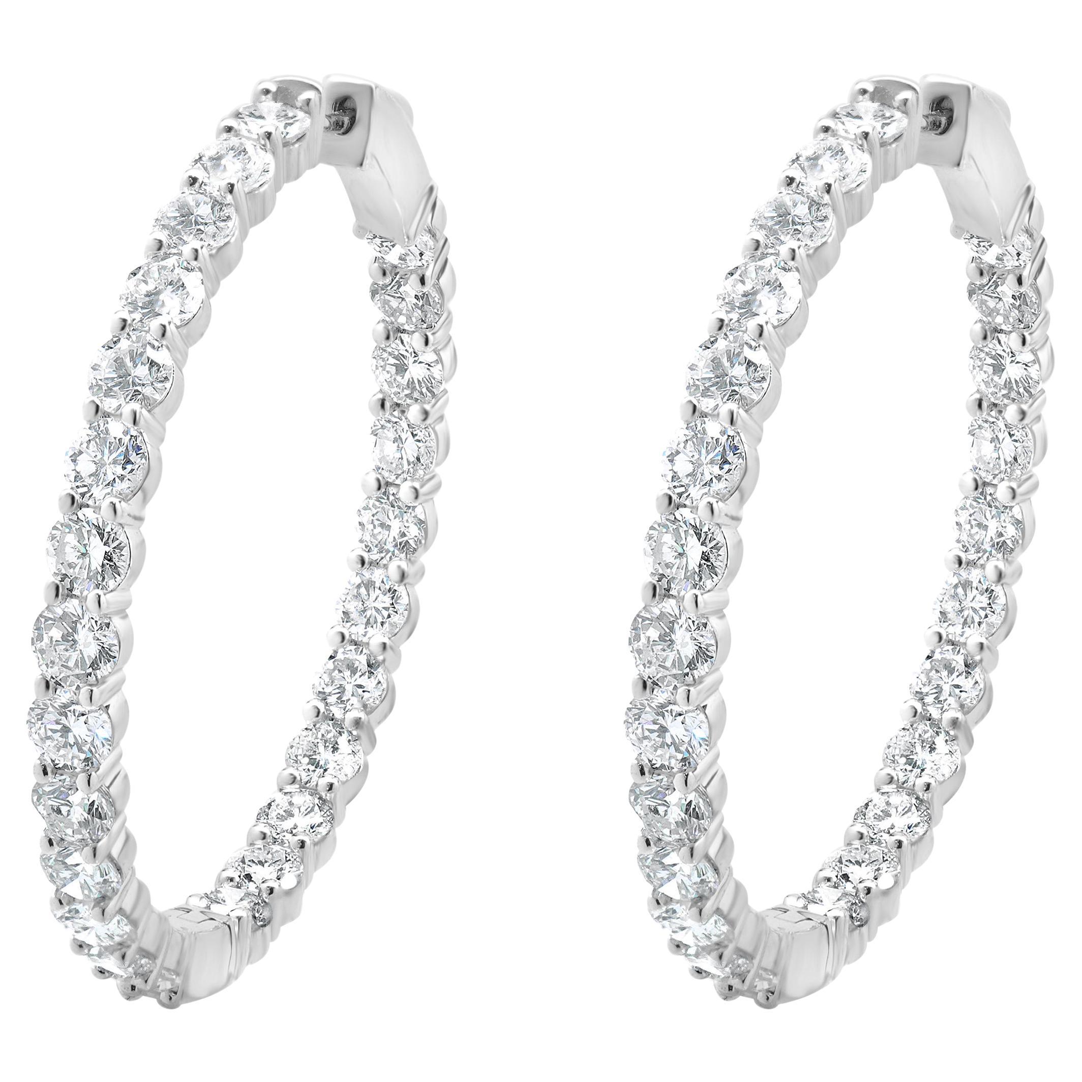 Pendientes de aro con interior y exterior de diamantes en oro blanco de 18 quilates