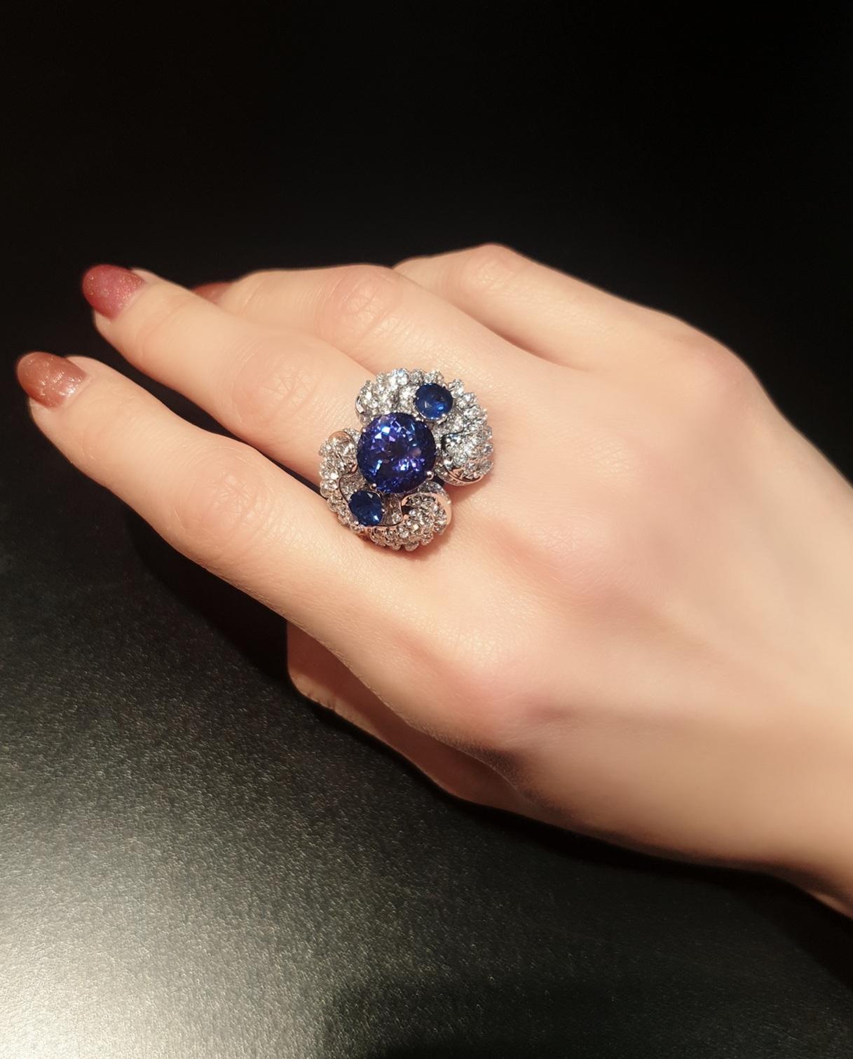 Round Cut 18 Karat White Gold Diamond Intensive Color Tanzanite Ring in Angel Wing For Sale