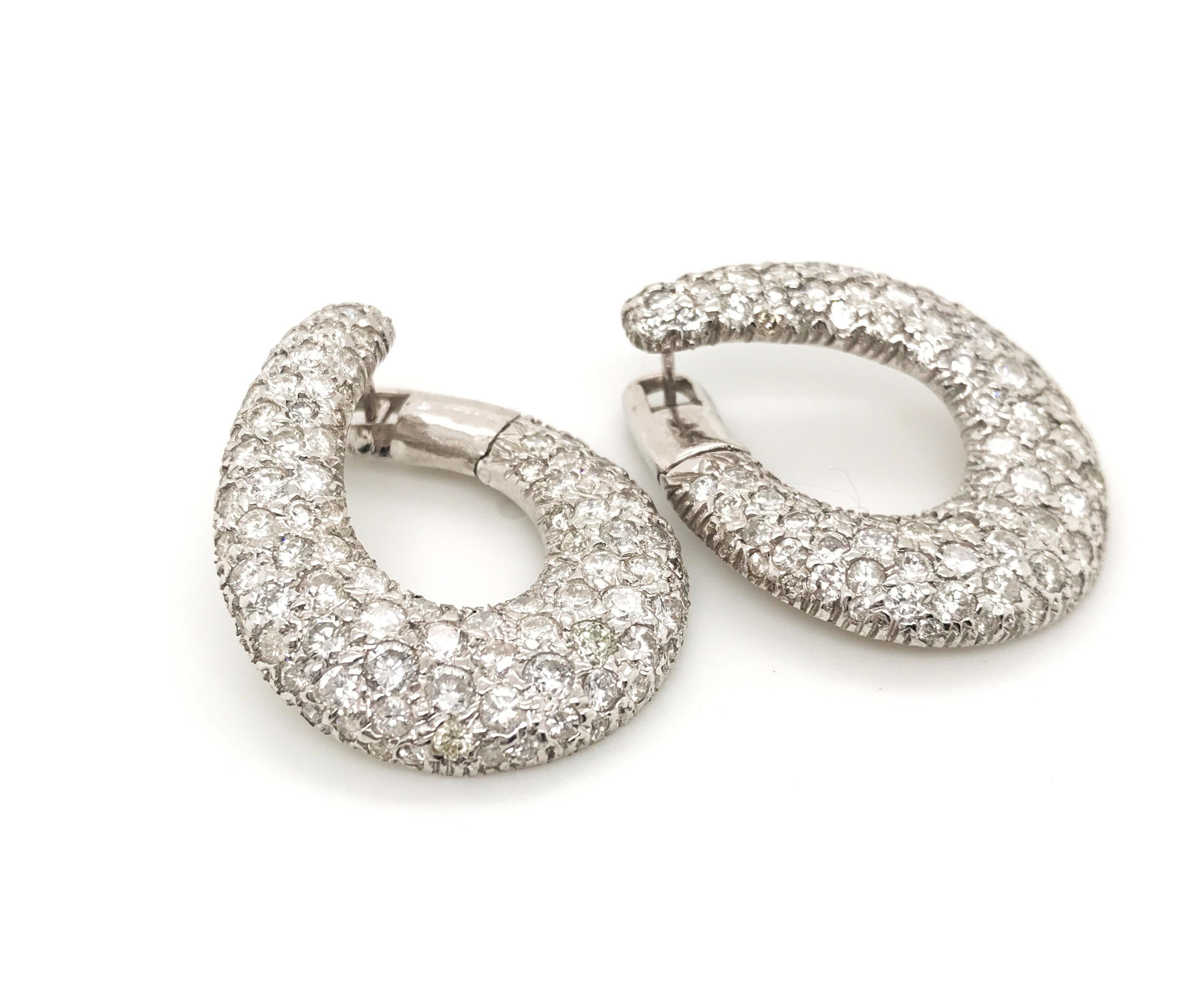 Are you looking for some diamond hoop earrings that are different and have style? Look no further than these glorious Italian made diamond hoops that sit so perfectly on the ears. Hoops are a must in everyone's wardrobe but the problem with hoops is