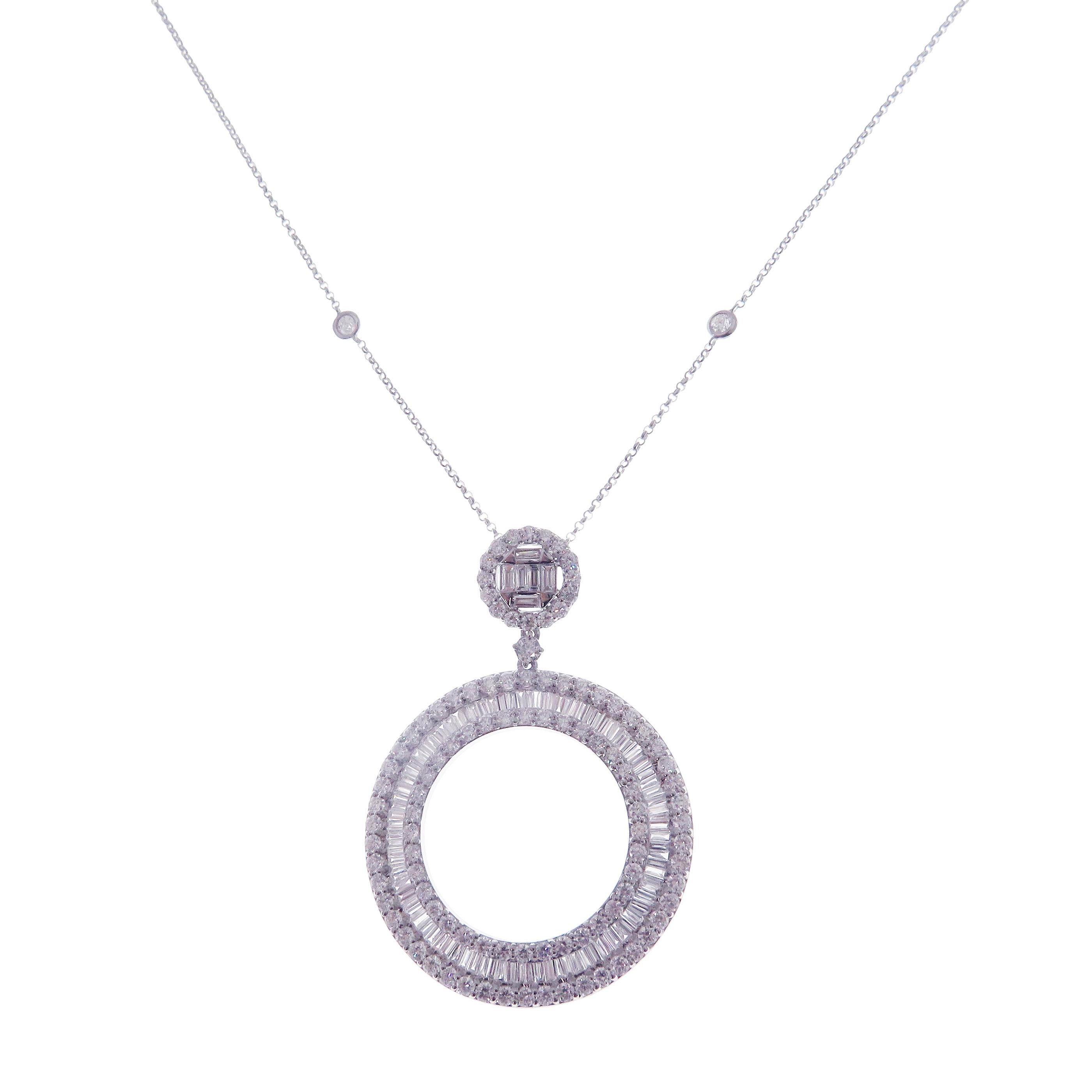 This diamond hollow circle necklace is crafted in 18-karat white gold, weighing approximately 5.50 total carats of SI-H Quality white diamonds.

Necklace is 16