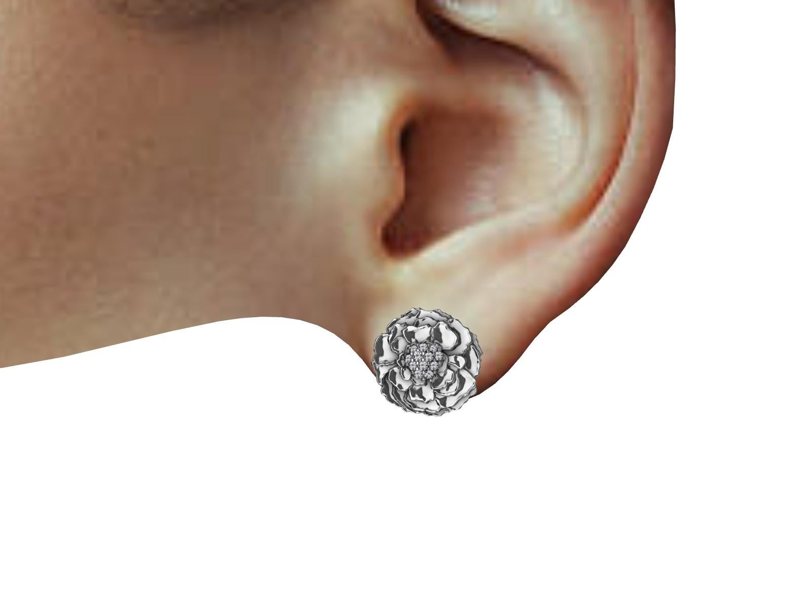 boucles d'oreilles en or blanc 18 carats avec diamants, les pétales de la fleur de souci. D'un de mes dessins imprimé en typographie.  5/8e de pouce x 7/16e de pouce  ou 14-15 mm de diamètre. diamants d'un poids de .281 carats, G, SI1.
Fabriqué sur