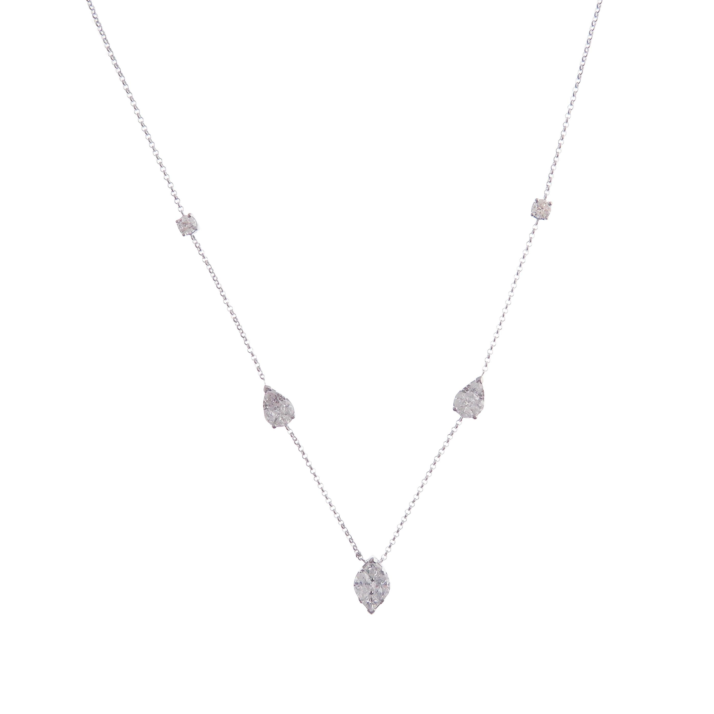 This necklace is crafted in 18-karat white gold, weighing approximately 1.65 total carats of SI-V Quality white diamond. 

Necklace is 16