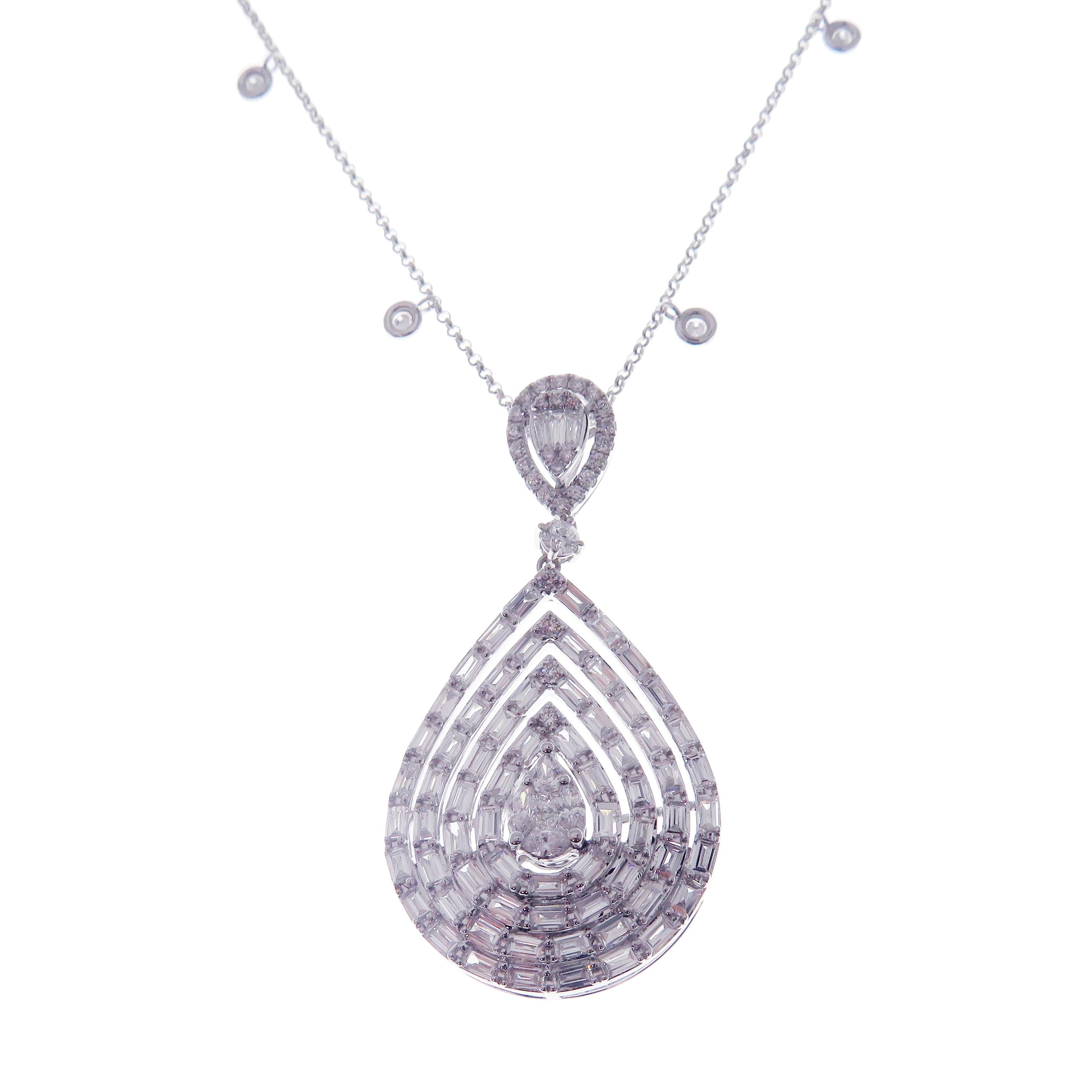 This diamond baguette pear necklace is crafted in 18-karat white gold, weighing approximately 3.30 total carats of SI-V Quality white diamonds.

Necklace is 16