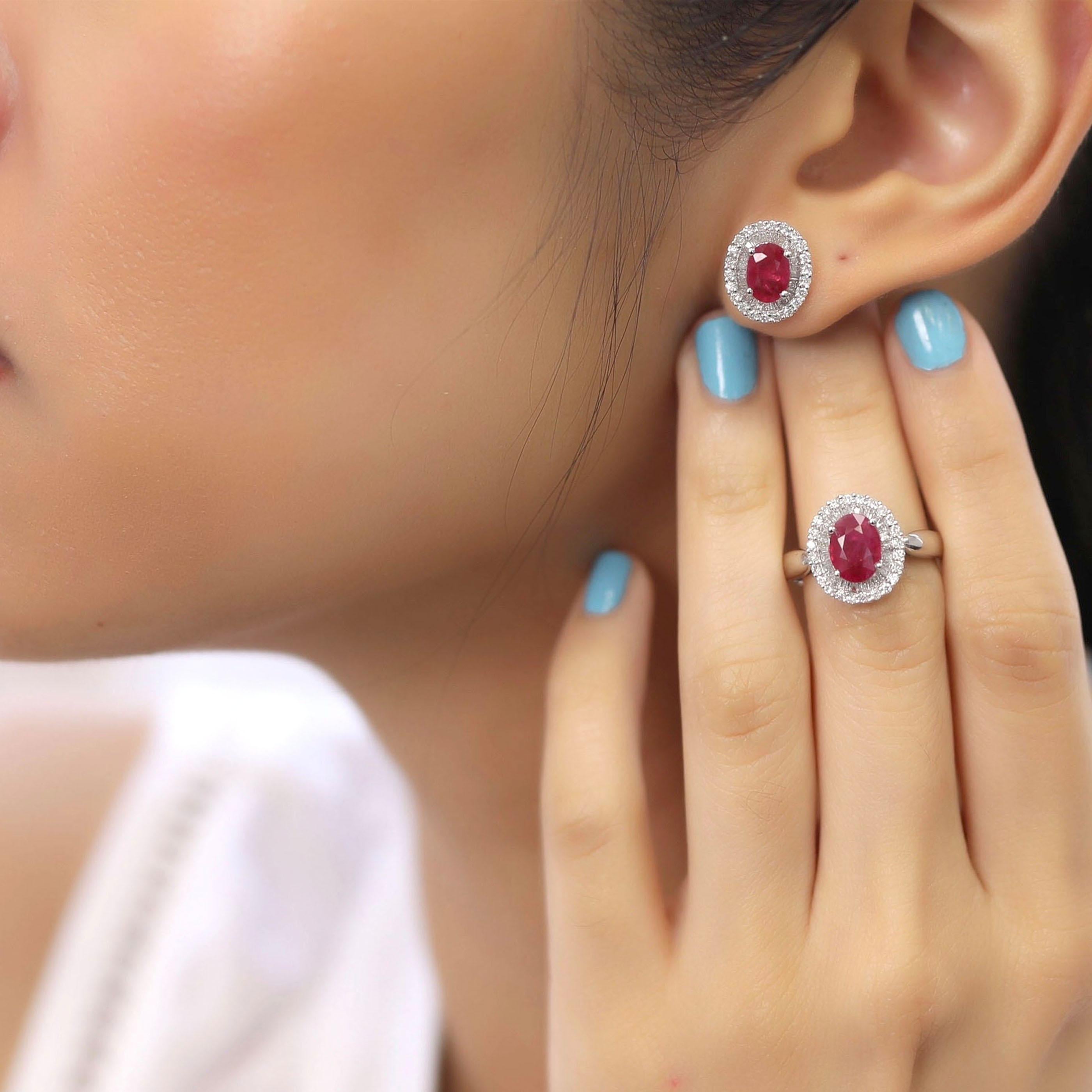 This small ruby earring and ring set is crafted in 18-karat white gold, weighing approximately 1.16 total carats of SI-H Quality white diamonds and 3.46 total carats of ruby stones. The ring is comfortable and can be sized 