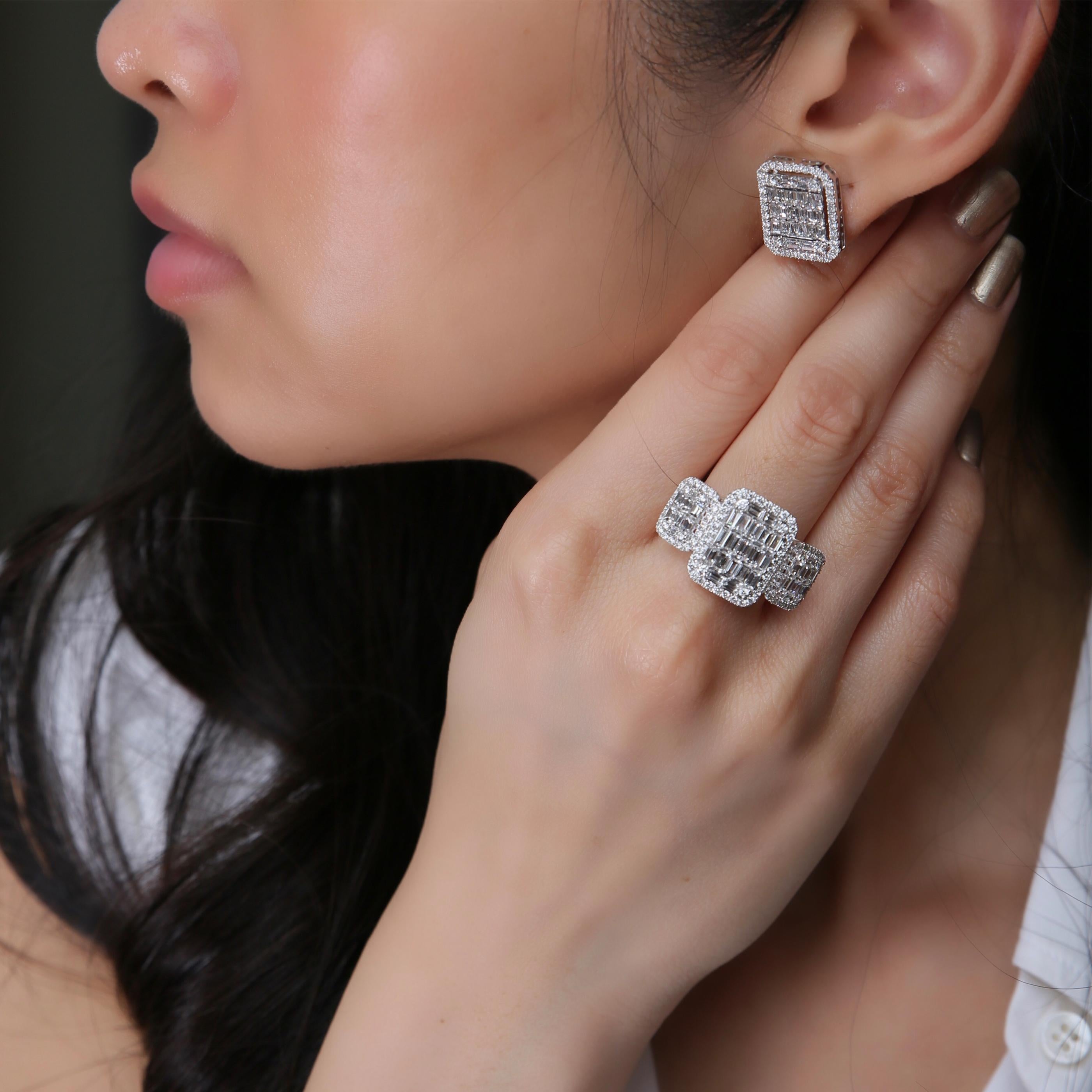 This medium diamond earring and ring set is crafted in 18-karat white gold, weighing approximately 5.37 total carats of SI-V Quality white diamonds. The ring is comfortable and can be sized 