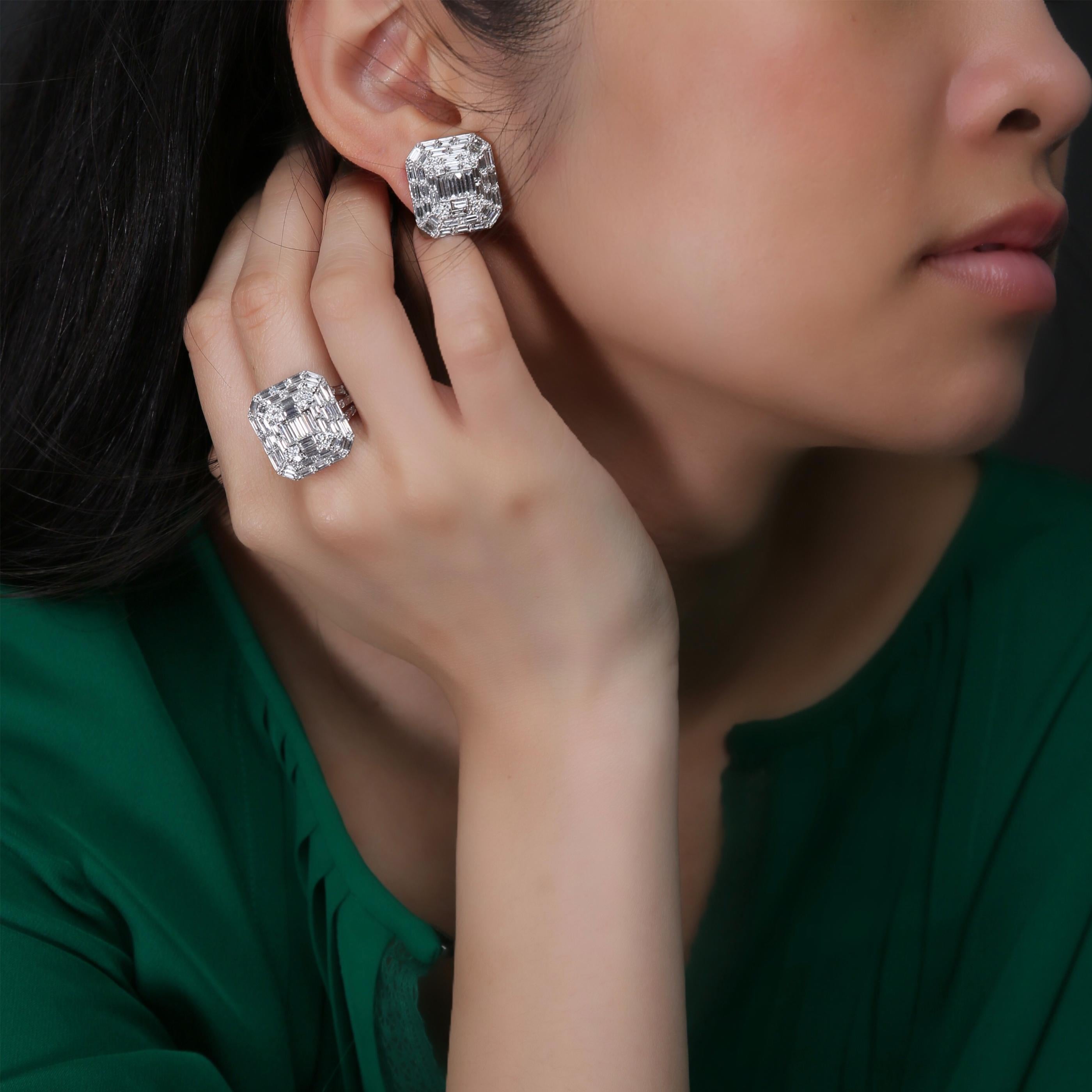 This medium diamond earring and ring set is crafted in 18-karat white gold, weighing approximately 6.12 total carats of SI-V Quality white diamonds. The ring is comfortable and can be sized 