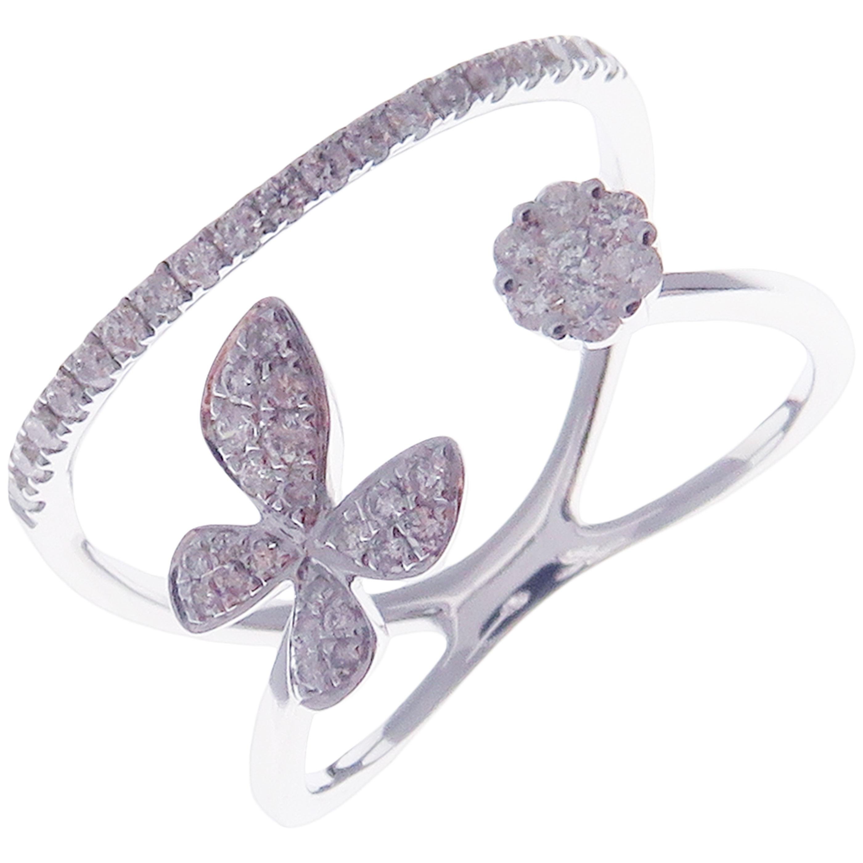 This trendy multi-layer butterfly ring is crafted in 18-karat white gold, featuring 48 round white diamonds totaling of 0.37 carats.
Approximate total weight 3.27 grams.
Standard Ring size 7
SI-G Quality natural white diamonds.
