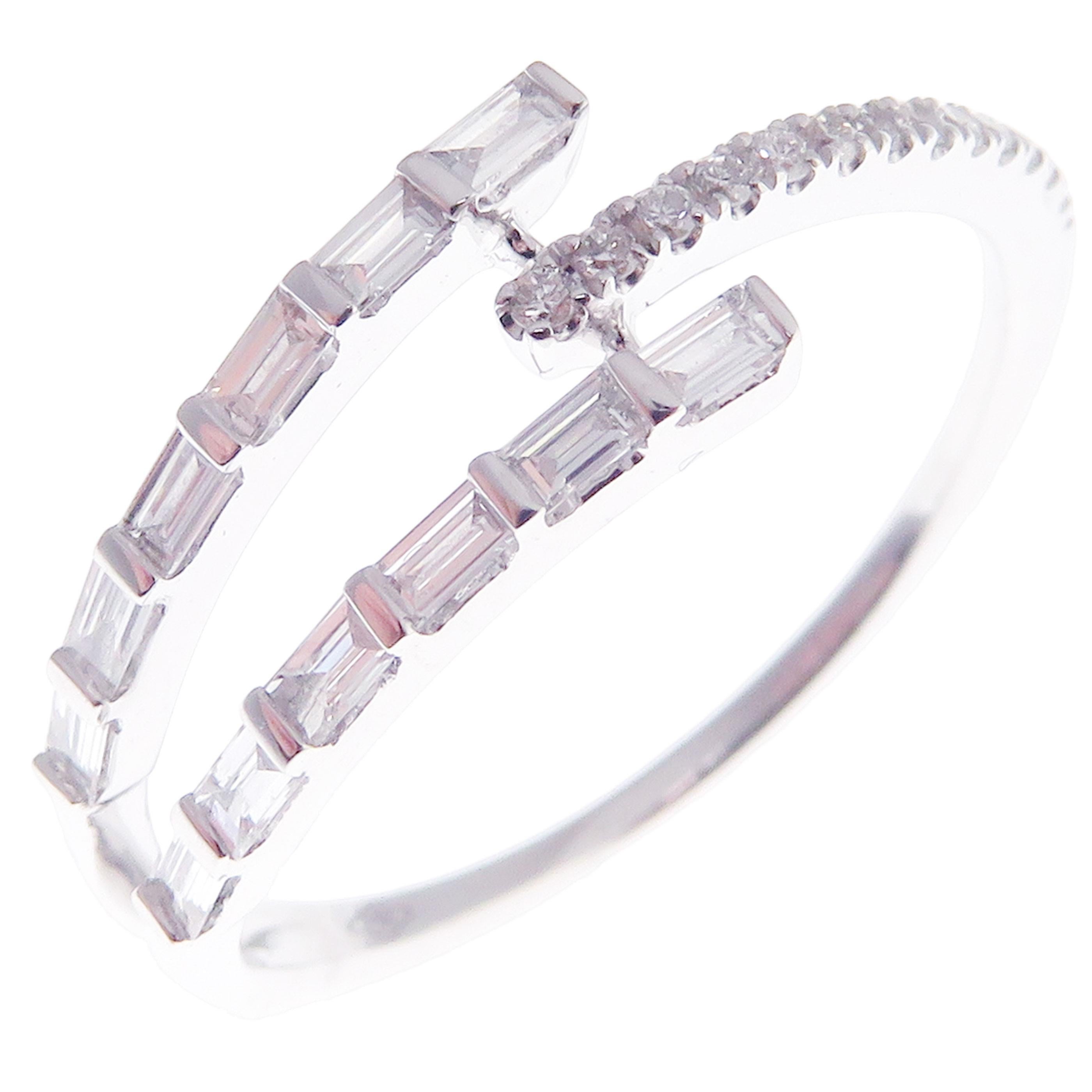 This trendy multi-layer ring is crafted in 18-karat white gold, featuring 13 round white diamonds totaling of 0.08 carats and 12 baguette white diamonds totaling of 0.20 carats.
Approximate total weight 1.91 grams.
Standard Ring size 7
SI-G Quality