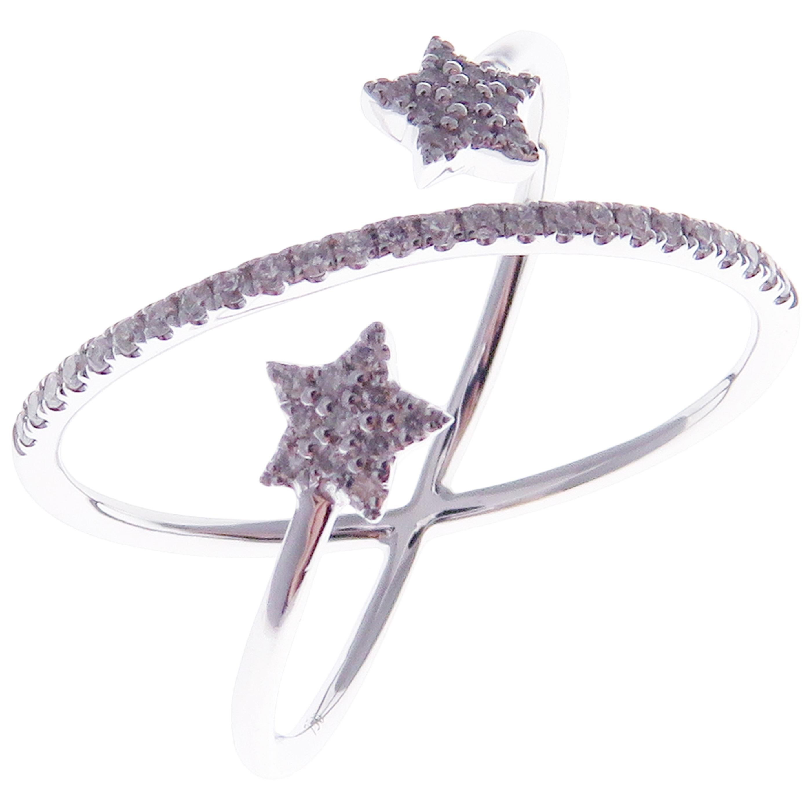 This trendy multi-layer wishing stars open ring is crafted in 18-karat white gold, featuring 47 round white diamonds totaling of 0.20 carats.
Approximate total weight 2.64 grams.
Standard Ring size 7
SI-G Quality natural white diamonds.
