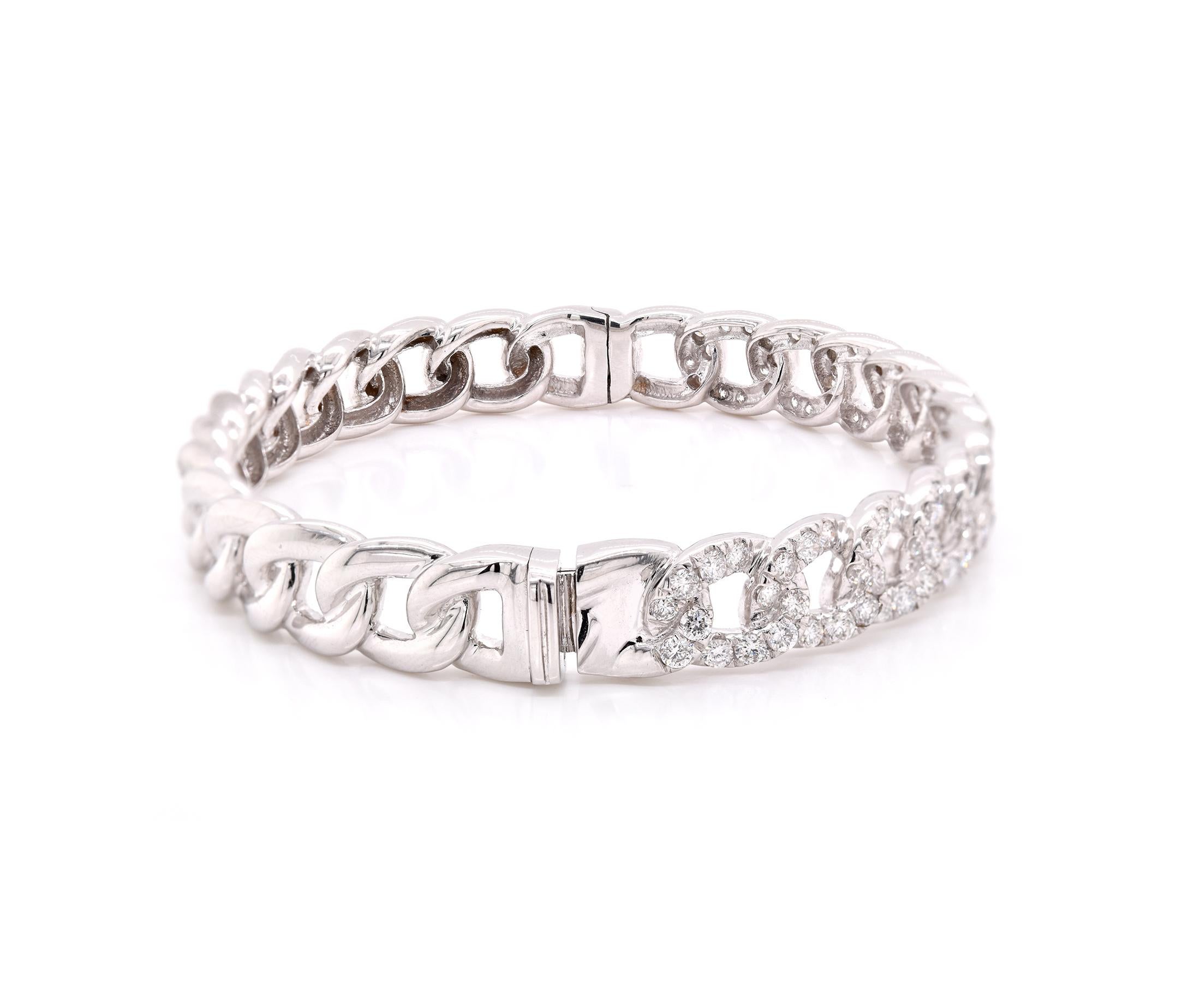 Material: 18K white gold
Diamonds:  100 round cut = 2.79cttw
Color: G
Clarity: VS
Dimensions: bracelet will fit up to a 6.5-inch wrist 
Weight: 27.96 grams
