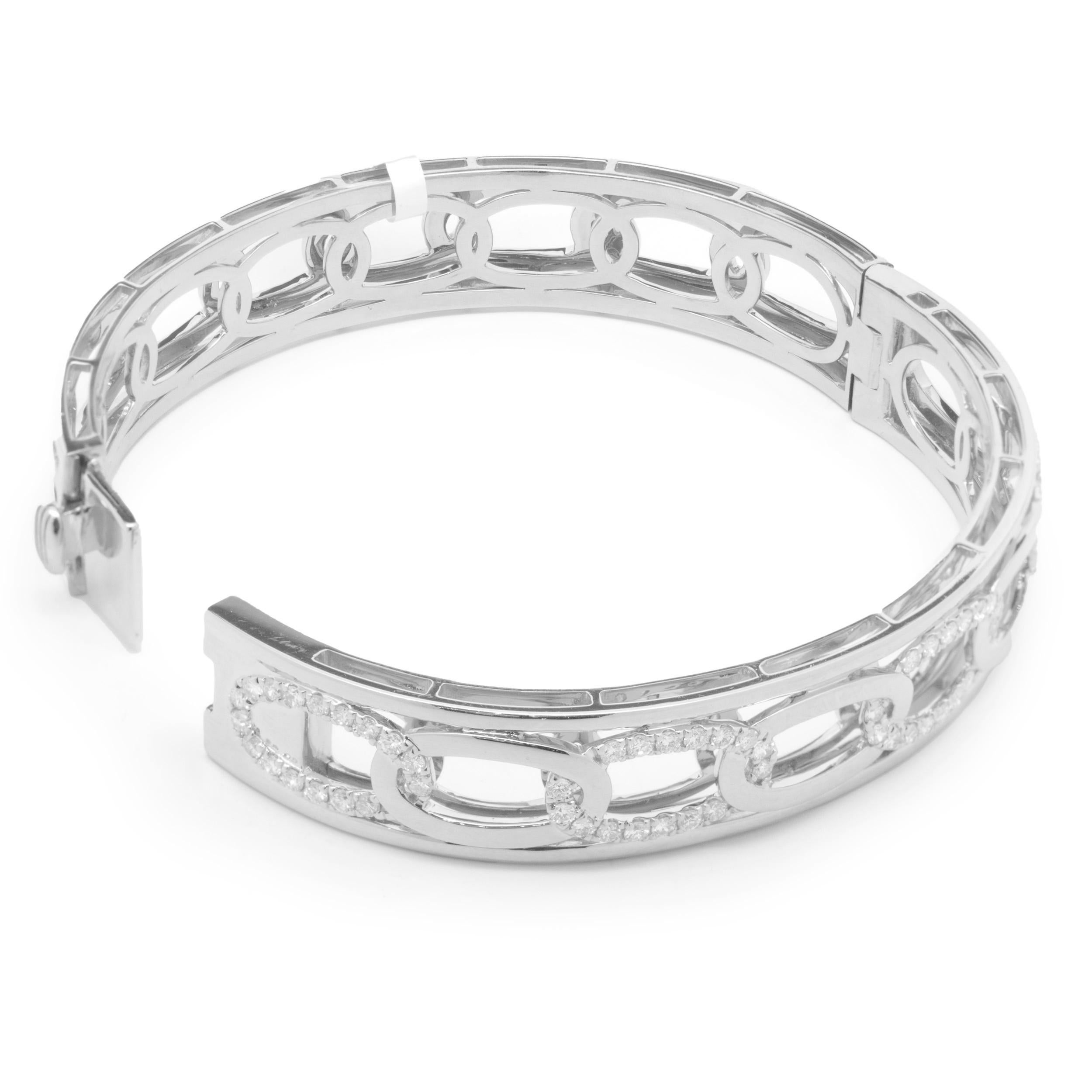 Designer: custom
Material: 18K white gold
Diamonds: 65 round brilliant cut = 1.25cttw
Color: F
Clarity: VS2
Dimensions: bracelet will fit up to a 7.5-inch wrist
Weight: 36.84 grams