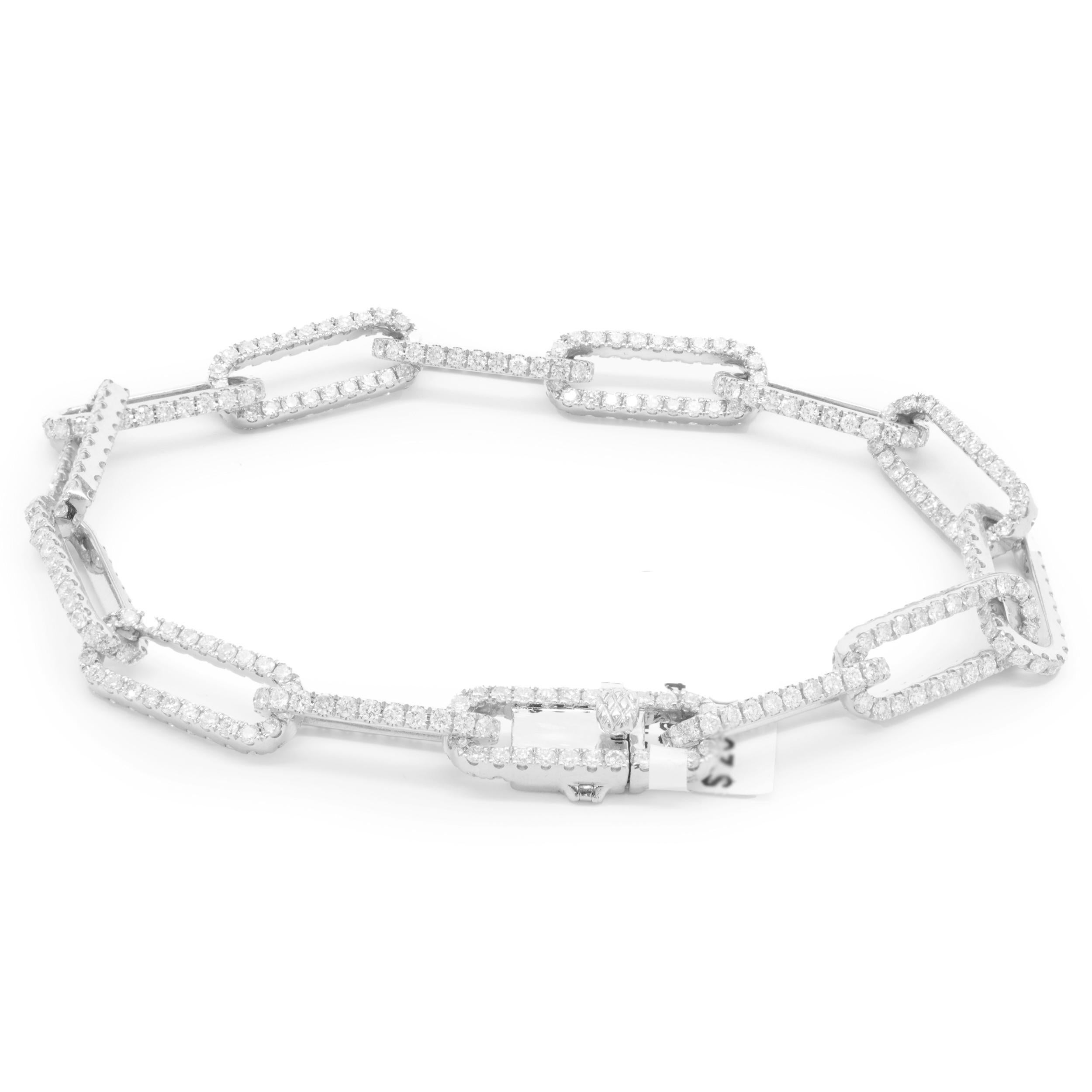 Designer: custom 
Material: 18K white gold
Diamond: 510 round brilliant cut = 5.50cttw
Color:  G
Clarity: VS1-2
Dimensions: bracelet measures 7.25-inches in length
Weight: 14.98 grams