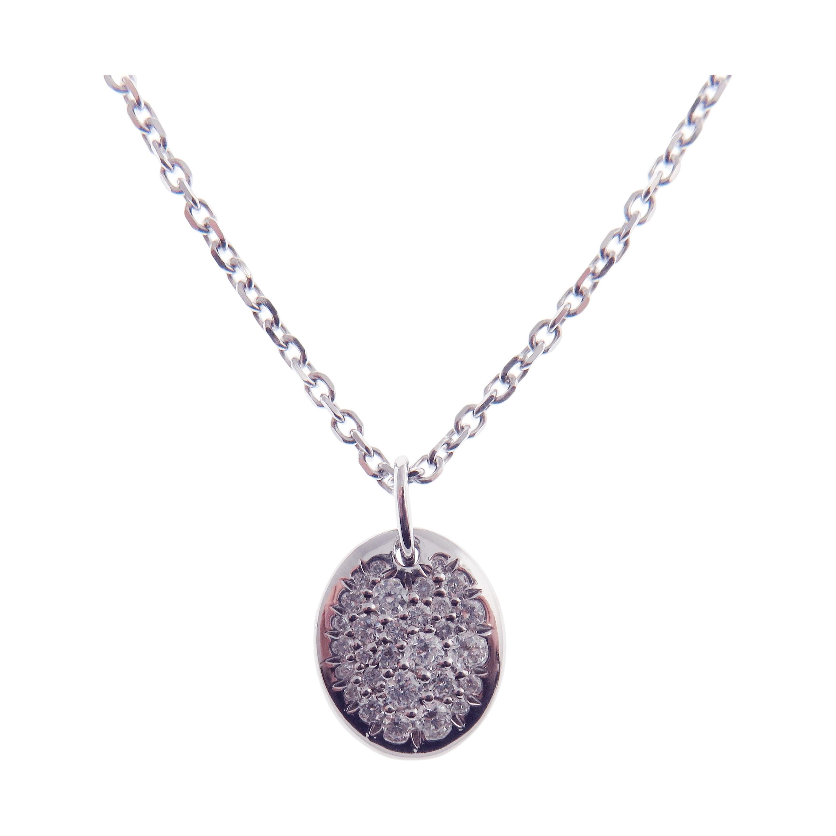 This pave circle necklace is crafted in 18-karat white gold, weighing approximately 0.27 total carats of SI-H Quality white diamond. 

Necklace is 16