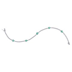 18 Karat White Gold Diamond Pear Shape Emerald Line Tennis Bracelet