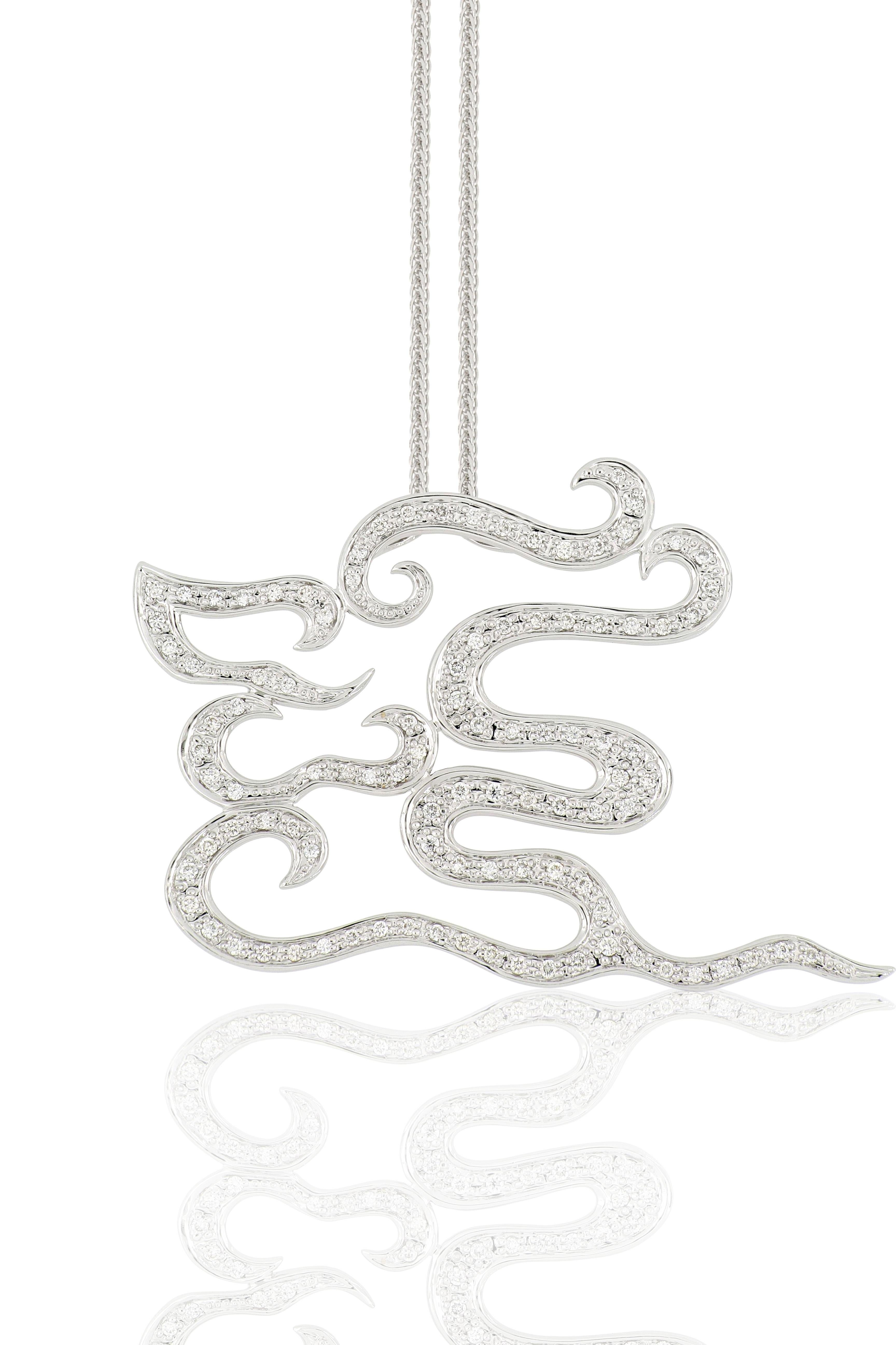  An ‘dragon-cloud’ pendant set with diamonds weighing 0.50 carats, mounted in 18 Karat white gold. 
Auspicious Cloud represents happy wishes, it has a symbolic meaning of ‘good luck’ and peace in Chinese culture. This pendant of auspicious cloud