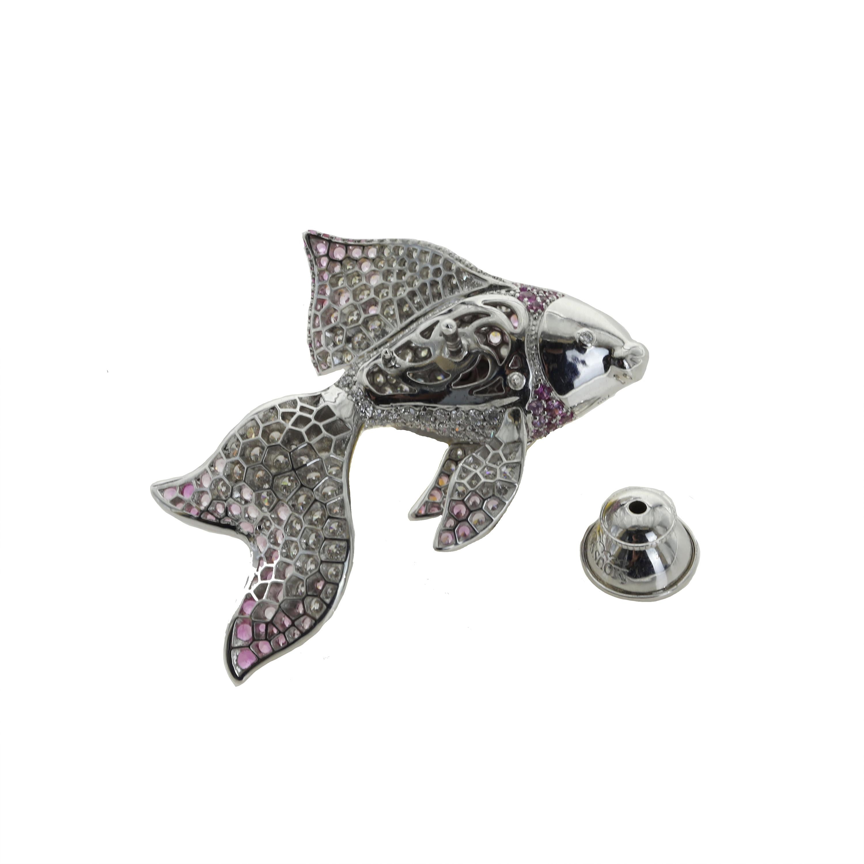 Diamond Pink Sapphire 18 Karat White Gold Golden Fish Brooch
The fins are moving.

37.3x26x9 mm
7.72 gm