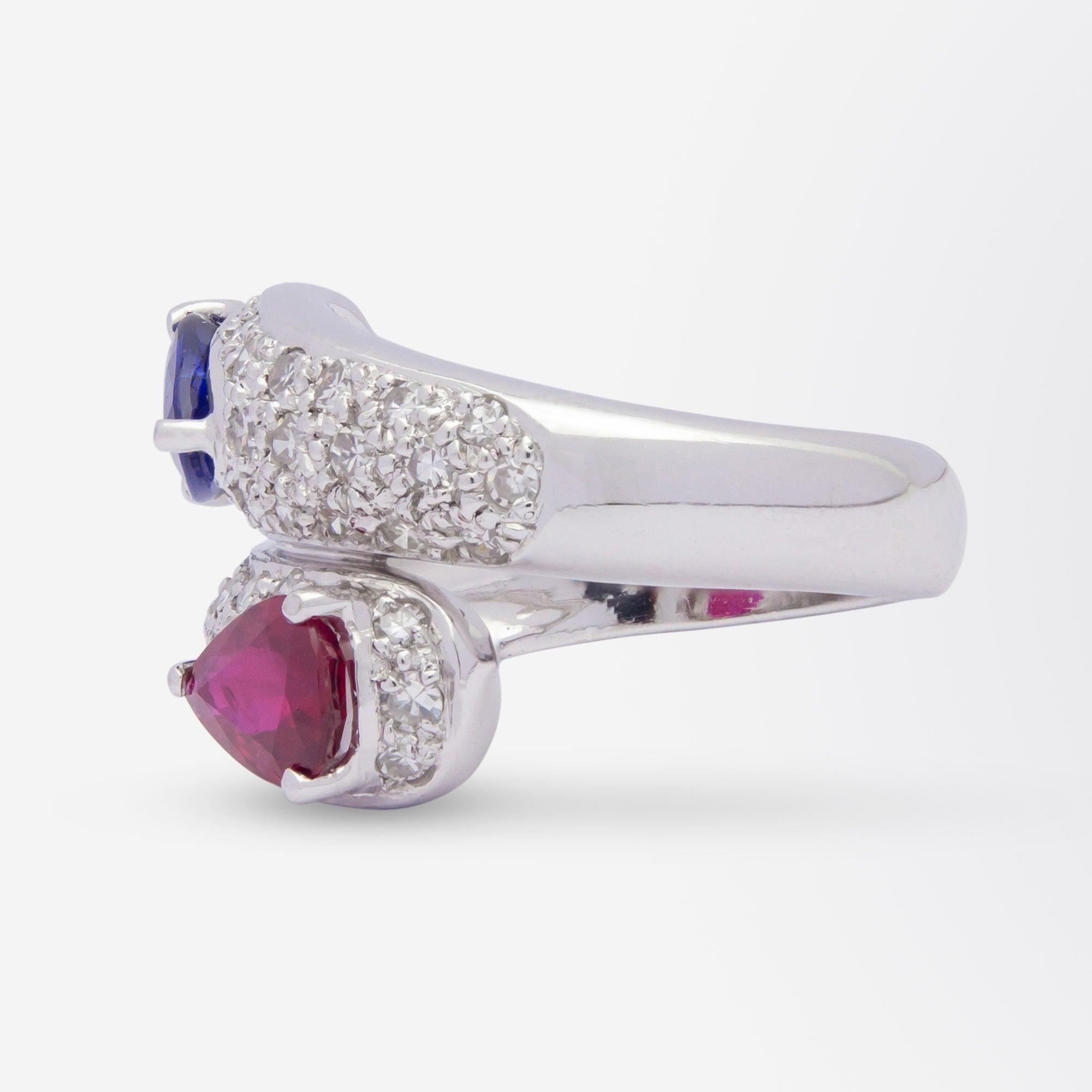 Pear Cut 18 Karat White Gold, Diamond, Ruby, and Sapphire Bypass Ring For Sale
