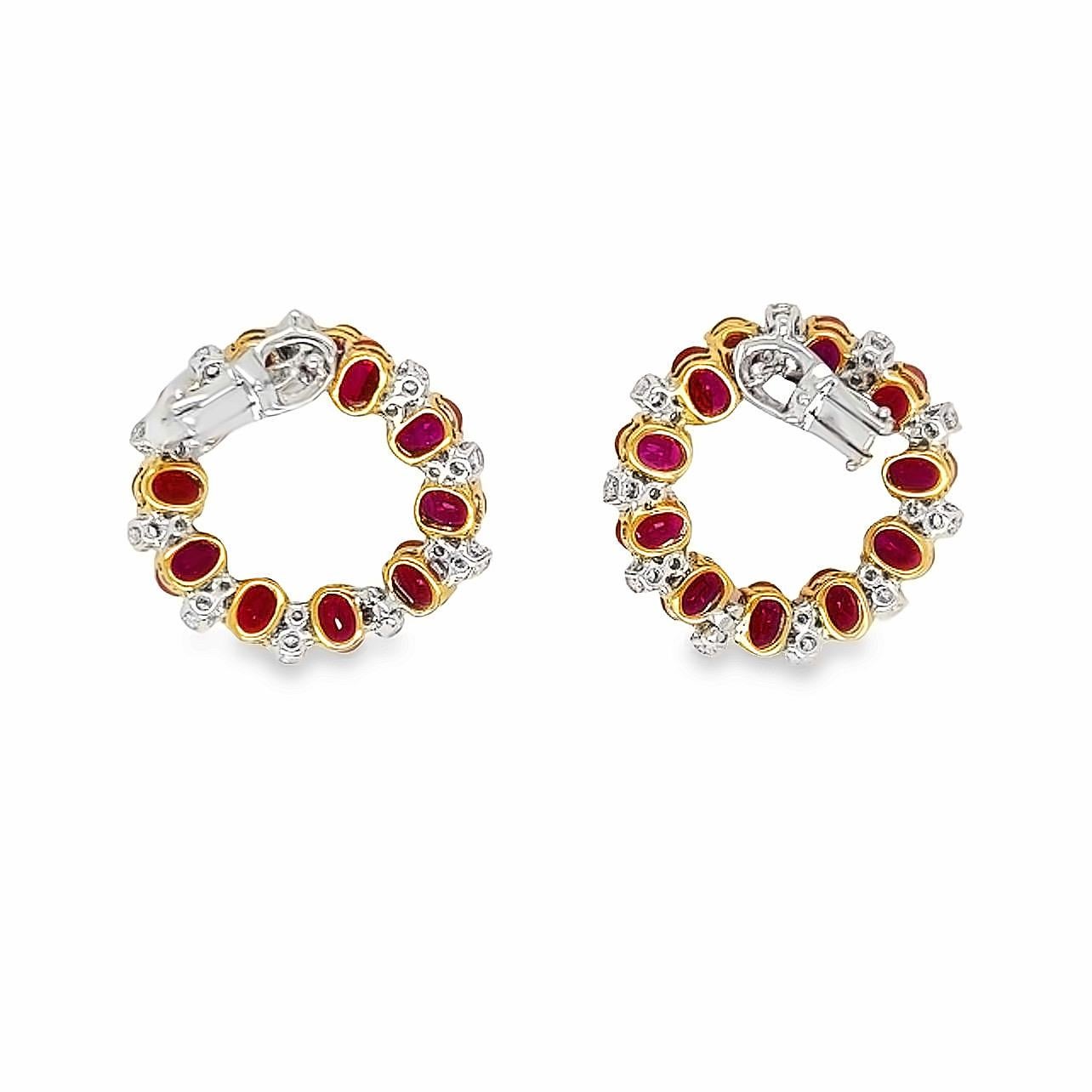 This 18K white gold elegant drop earrings are from our Timeless collection. These stud earrings are made of natural white diamonds in total of 2.13 Carat and natural oval red rubies in total of 13.07 Carat. Total metal weight is 13 gr. The diameter