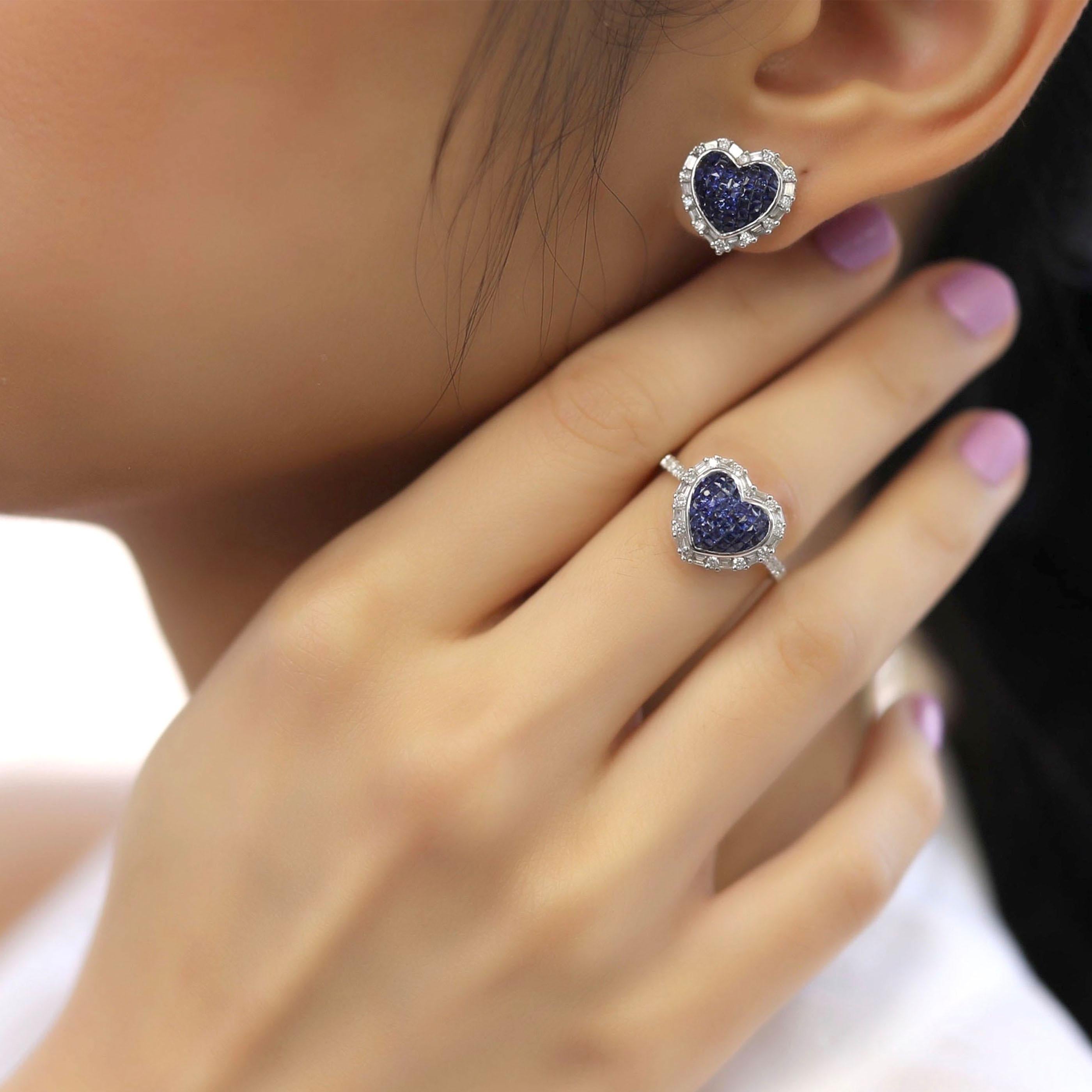 This sapphire sweet heart earring and ring set is crafted in 18-karat white gold, weighing approximately 0.85 total carats of SI-H Quality white diamonds and 1.90 total carats of blue sapphire. The ring is comfortable and can be sized 