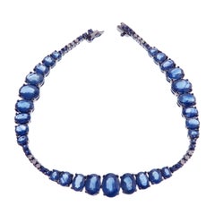 18 Karat White Gold Diamond Sapphire Wave Abstract Tennis Bracelet