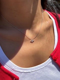 18 Karat White Gold Diamond Scrolled Evil Eye Pendant Necklace